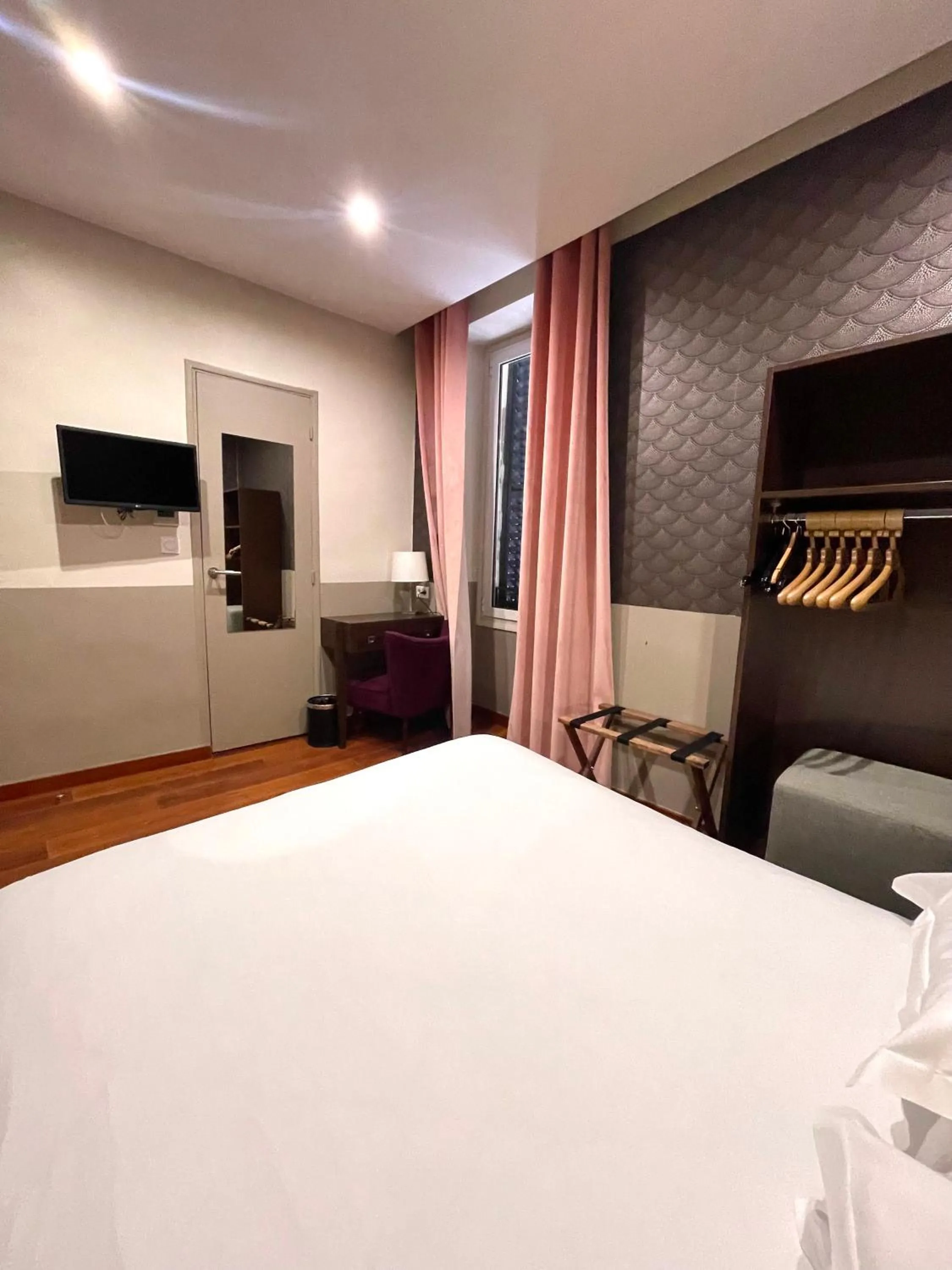 Decorative detail, Bed in Hotel Restaurant Christophe Colomb