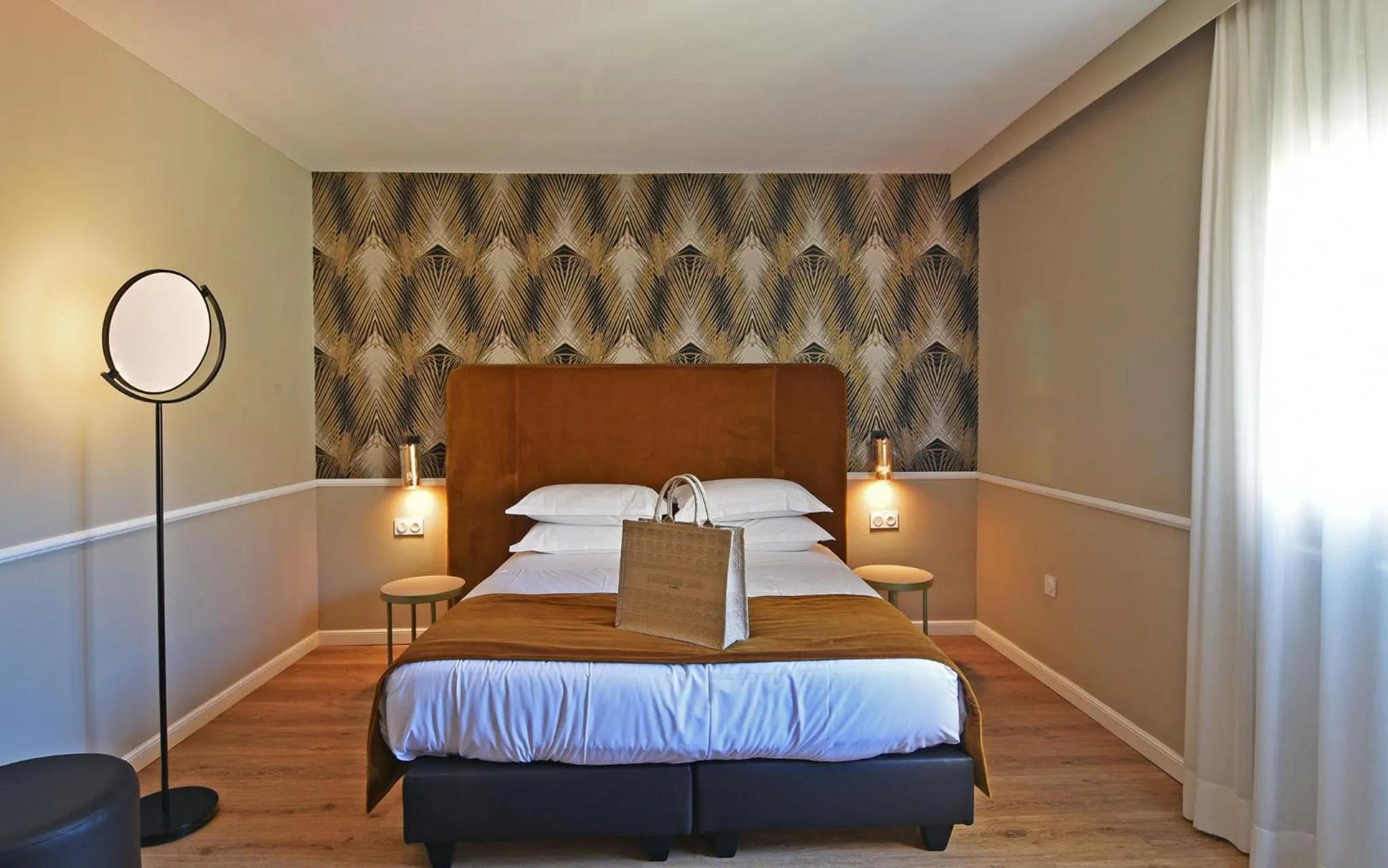 Bed in Hotel Restaurant Christophe Colomb