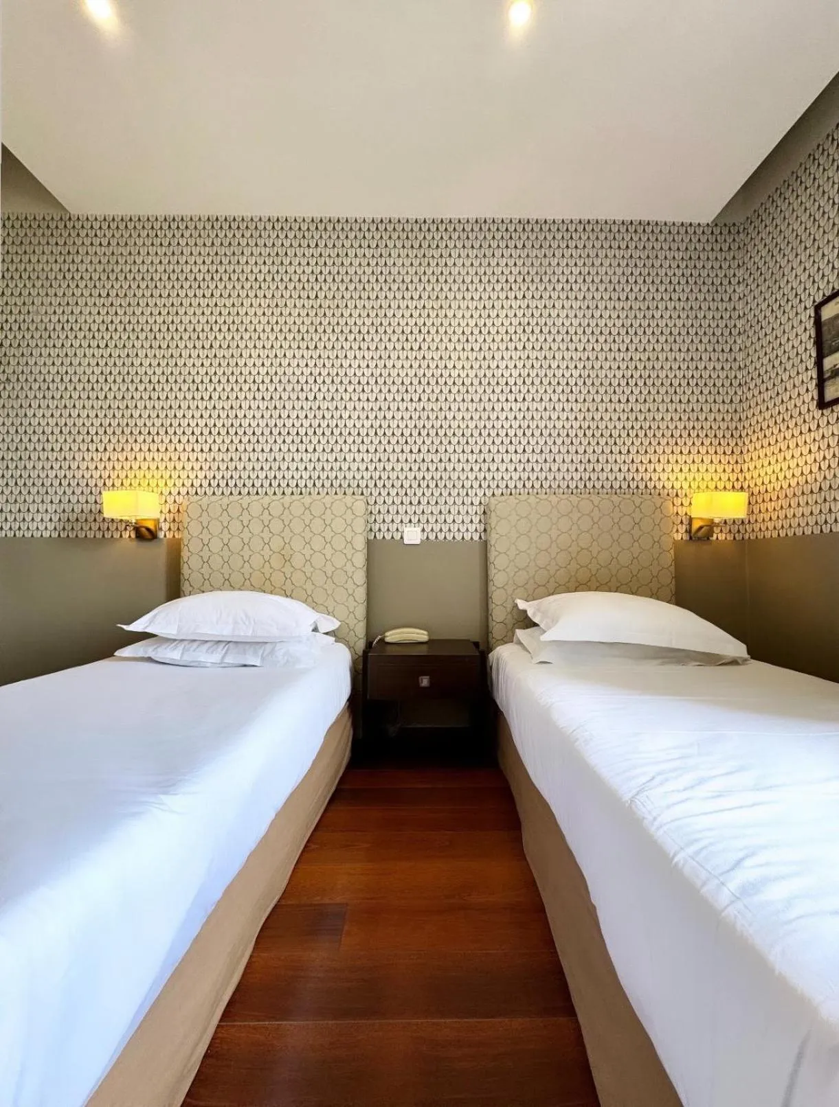 Bed in Hotel Restaurant Christophe Colomb