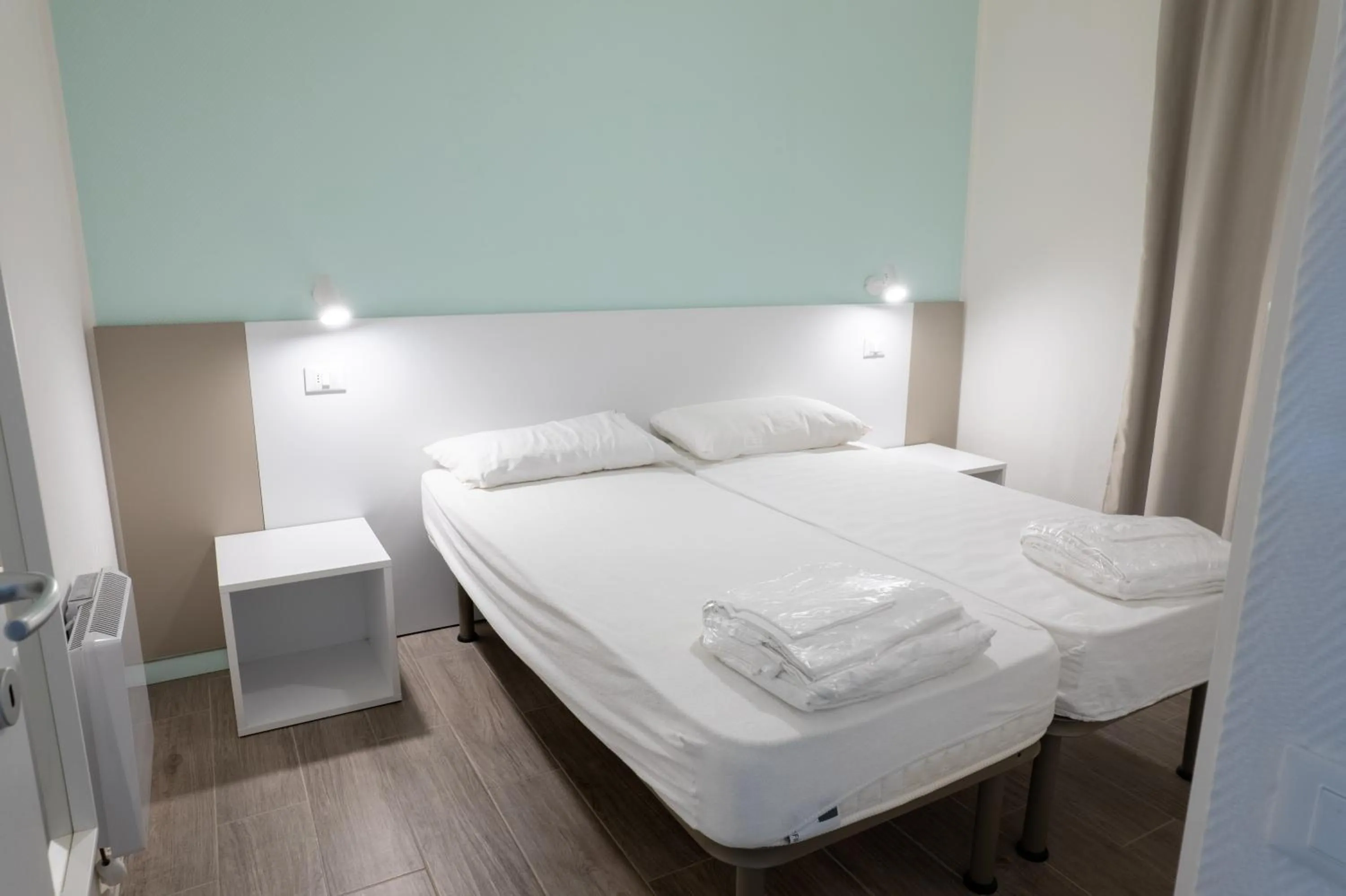 Bed in Golfo del Sole Hotel & Holiday Resort