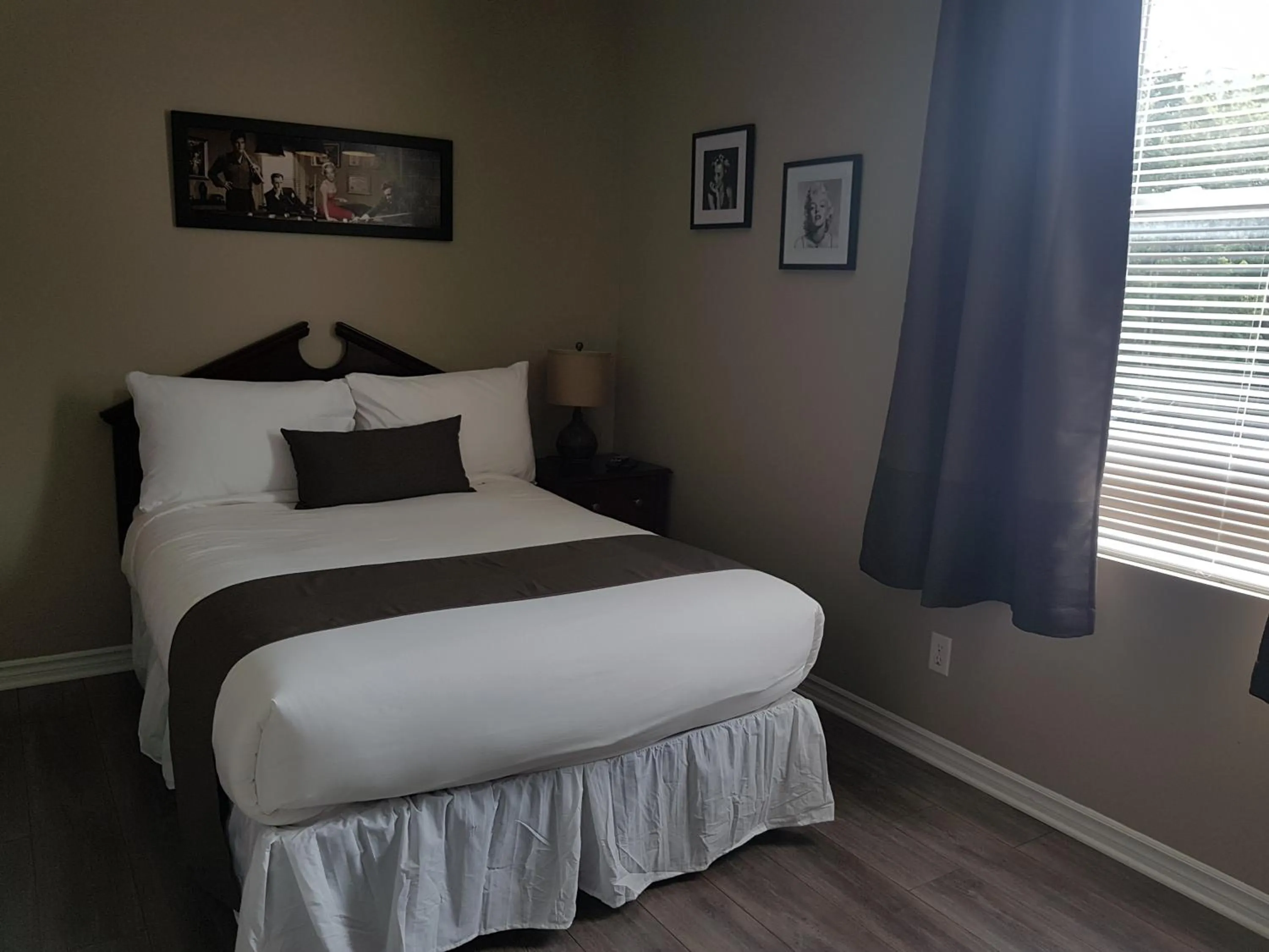 Bed in Cozy 1-Bedroom Suite #17 by Amazing Property Rentals