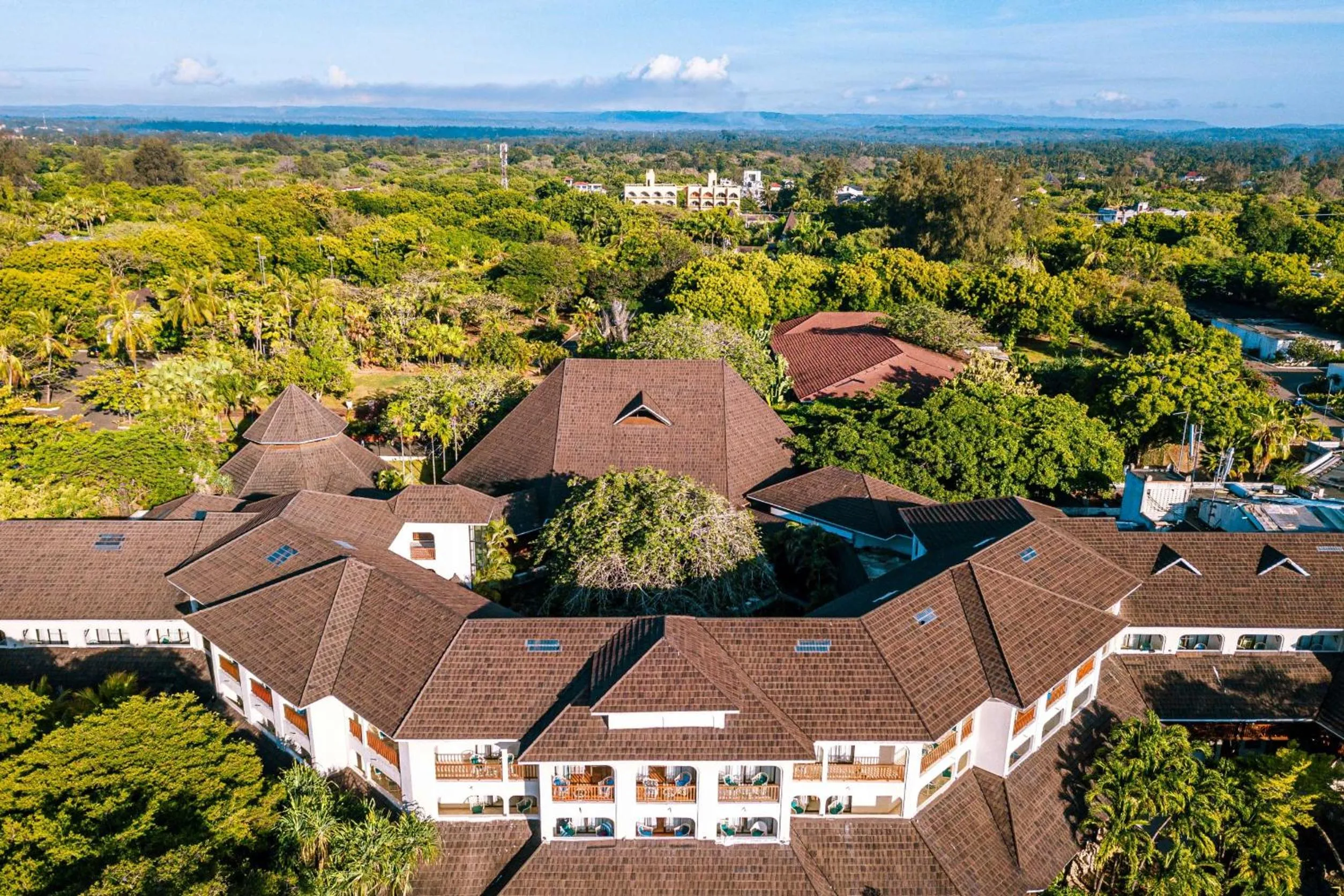 Property building in Diani Reef Beach Resort & Spa - Your Beachfront Bliss Awaits