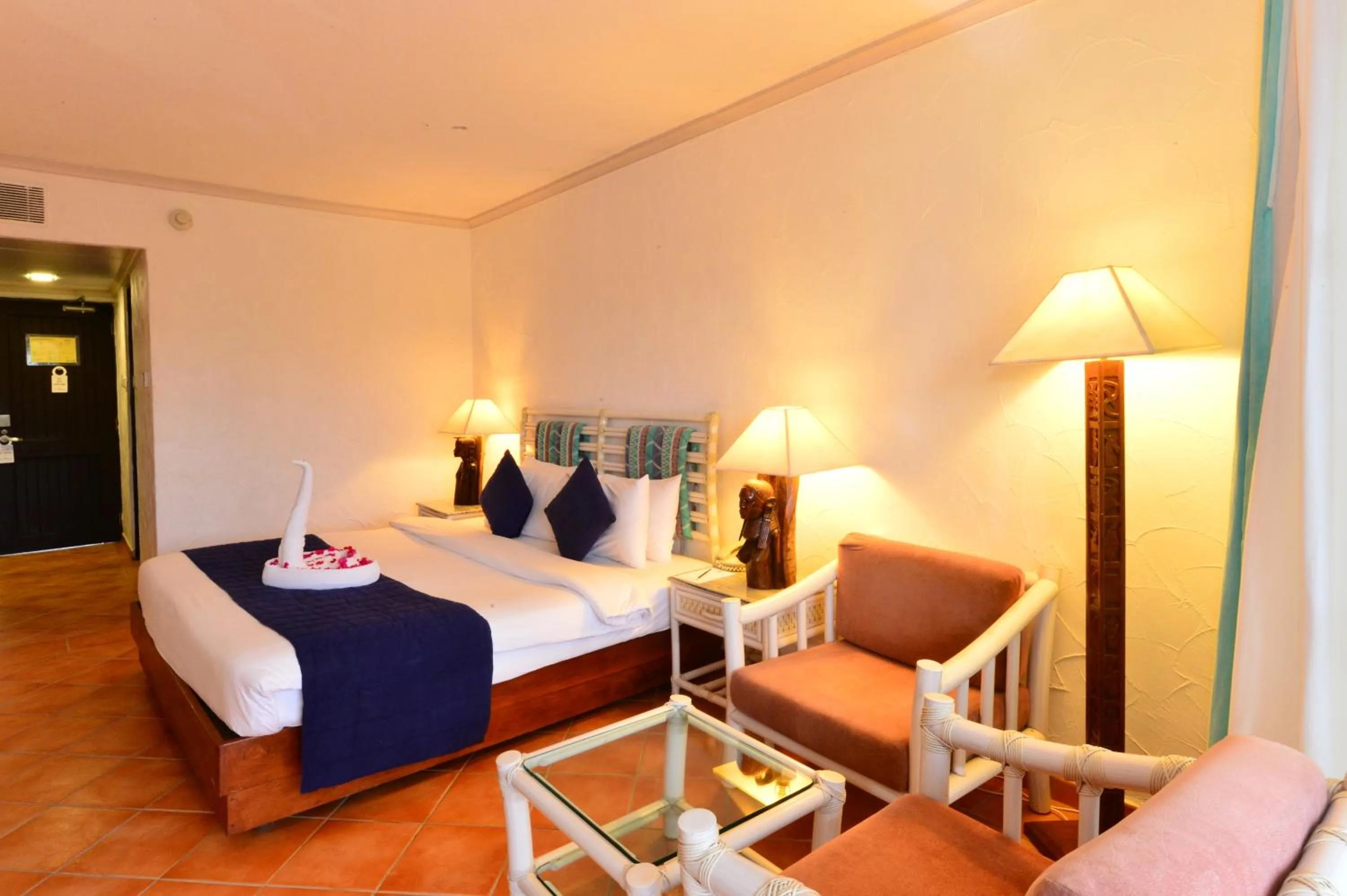 Bedroom, Bed in Diani Reef Beach Resort & Spa - Your Beachfront Bliss Awaits