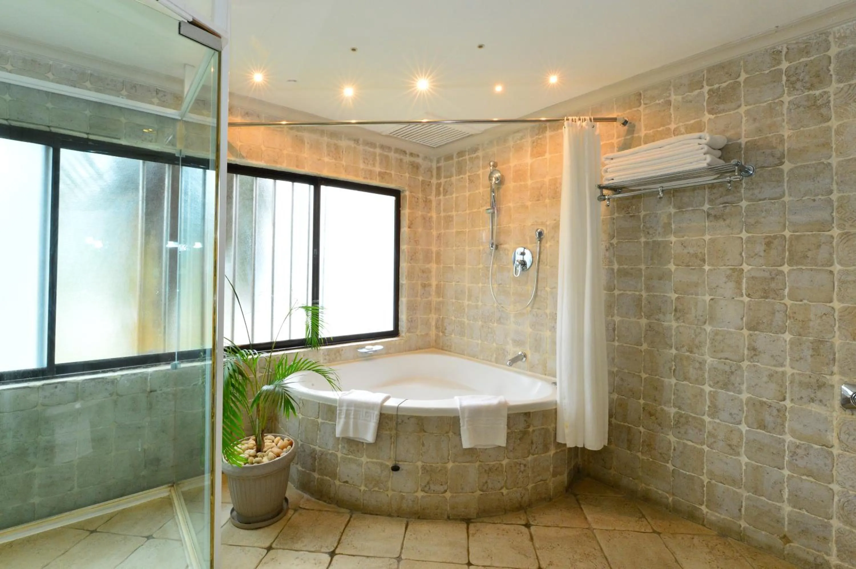 Bathroom in Diani Reef Beach Resort & Spa - Your Beachfront Bliss Awaits