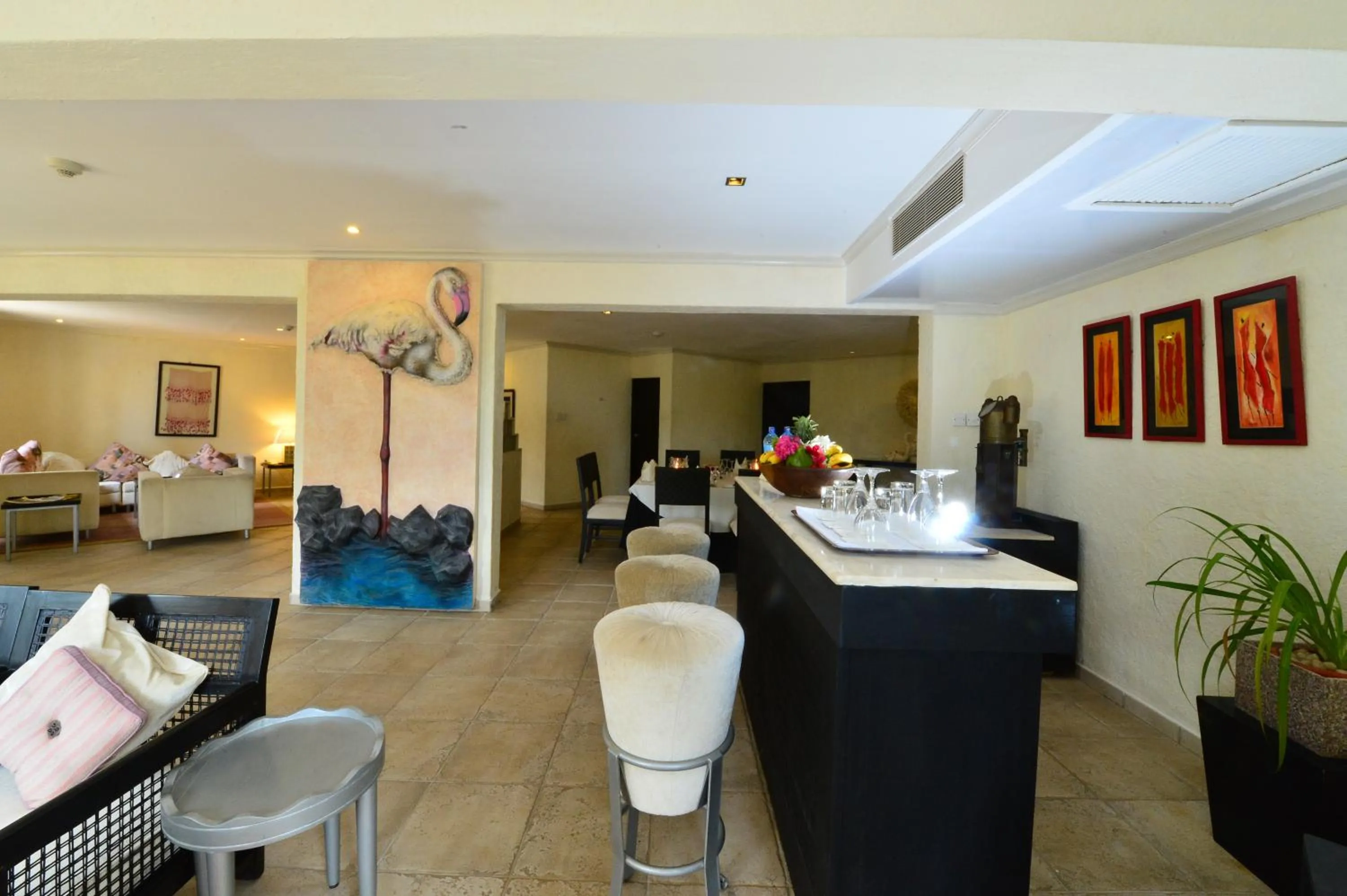 Lounge or bar in Diani Reef Beach Resort & Spa - Your Beachfront Bliss Awaits