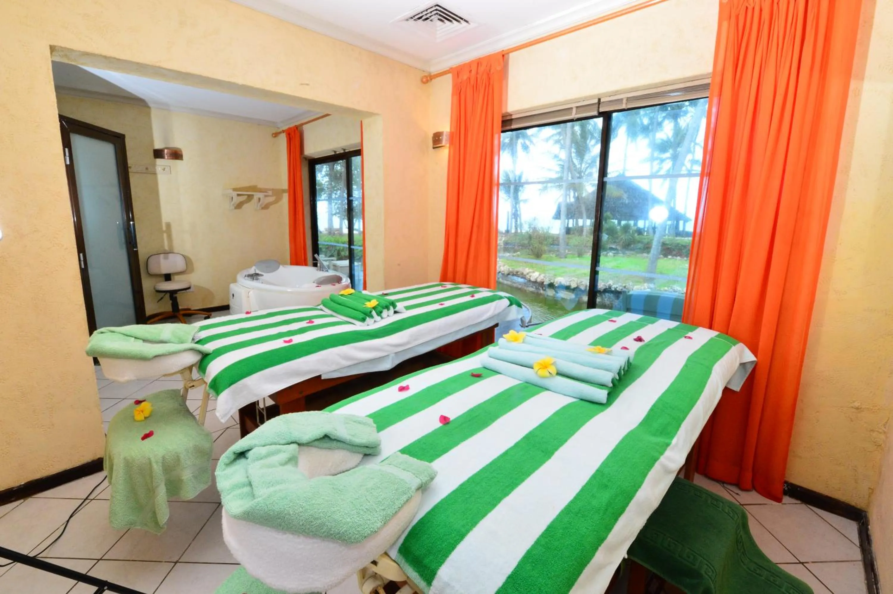 Massage, Bed in Diani Reef Beach Resort & Spa - Your Beachfront Bliss Awaits
