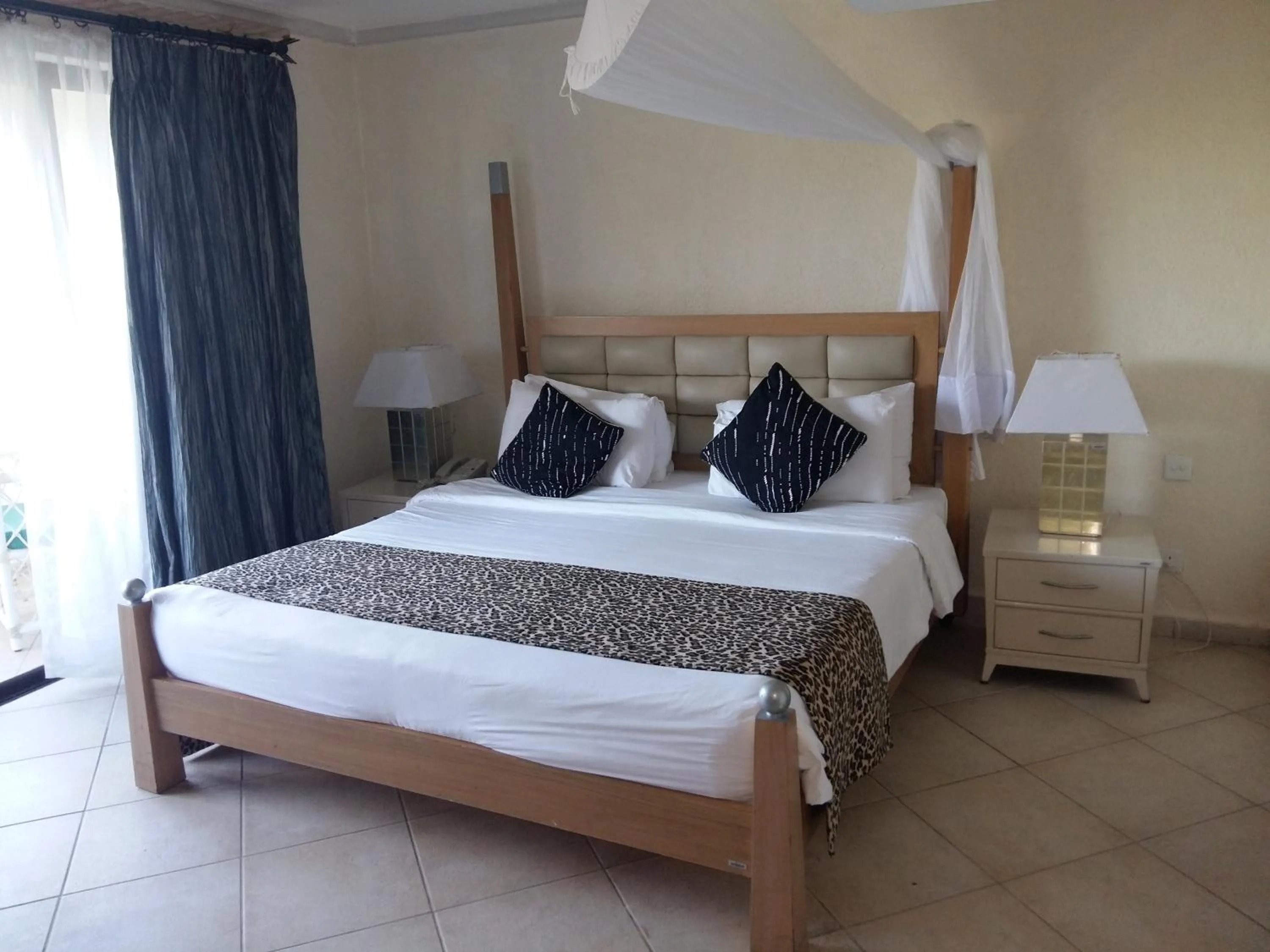 Bed in Diani Reef Beach Resort & Spa - Your Beachfront Bliss Awaits