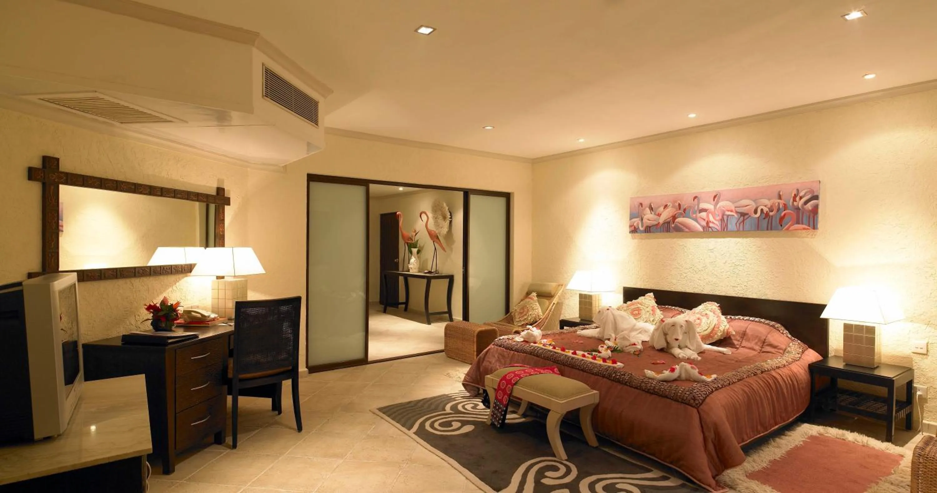 Photo of the whole room, Bed in Diani Reef Beach Resort & Spa - Your Beachfront Bliss Awaits