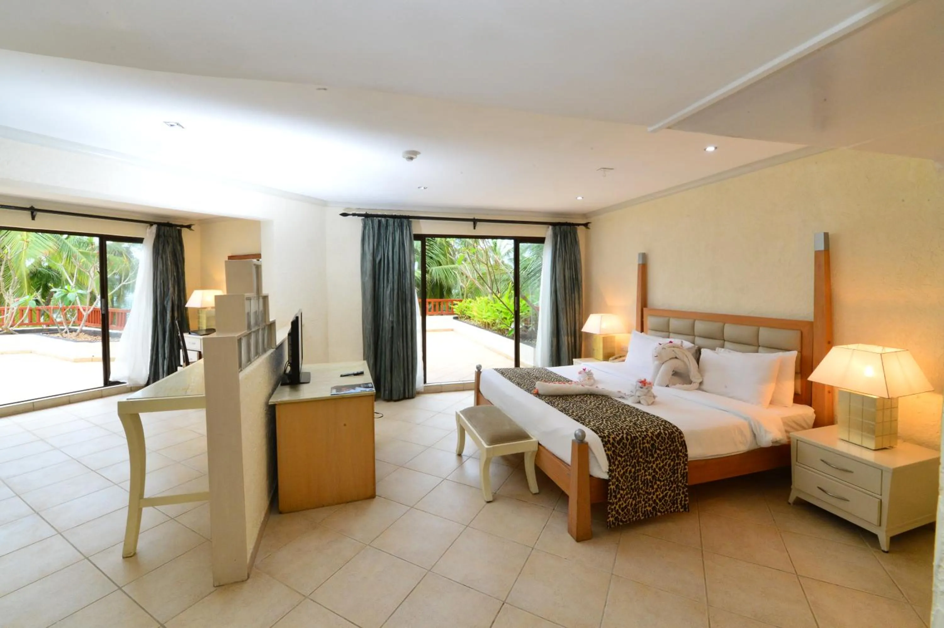Bedroom, Bed in Diani Reef Beach Resort & Spa - Your Beachfront Bliss Awaits