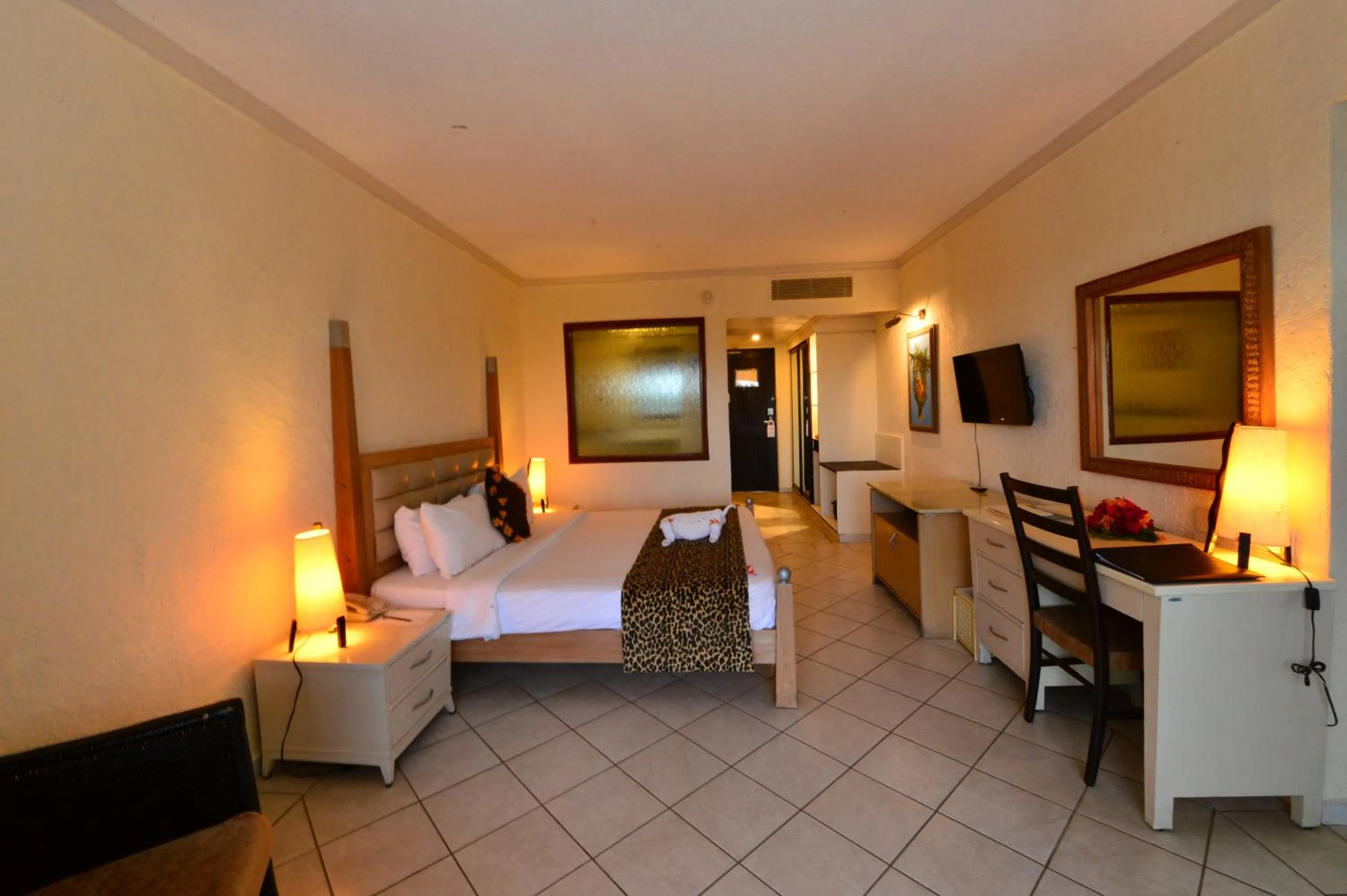 Bedroom, Bed in Diani Reef Beach Resort & Spa - Your Beachfront Bliss Awaits