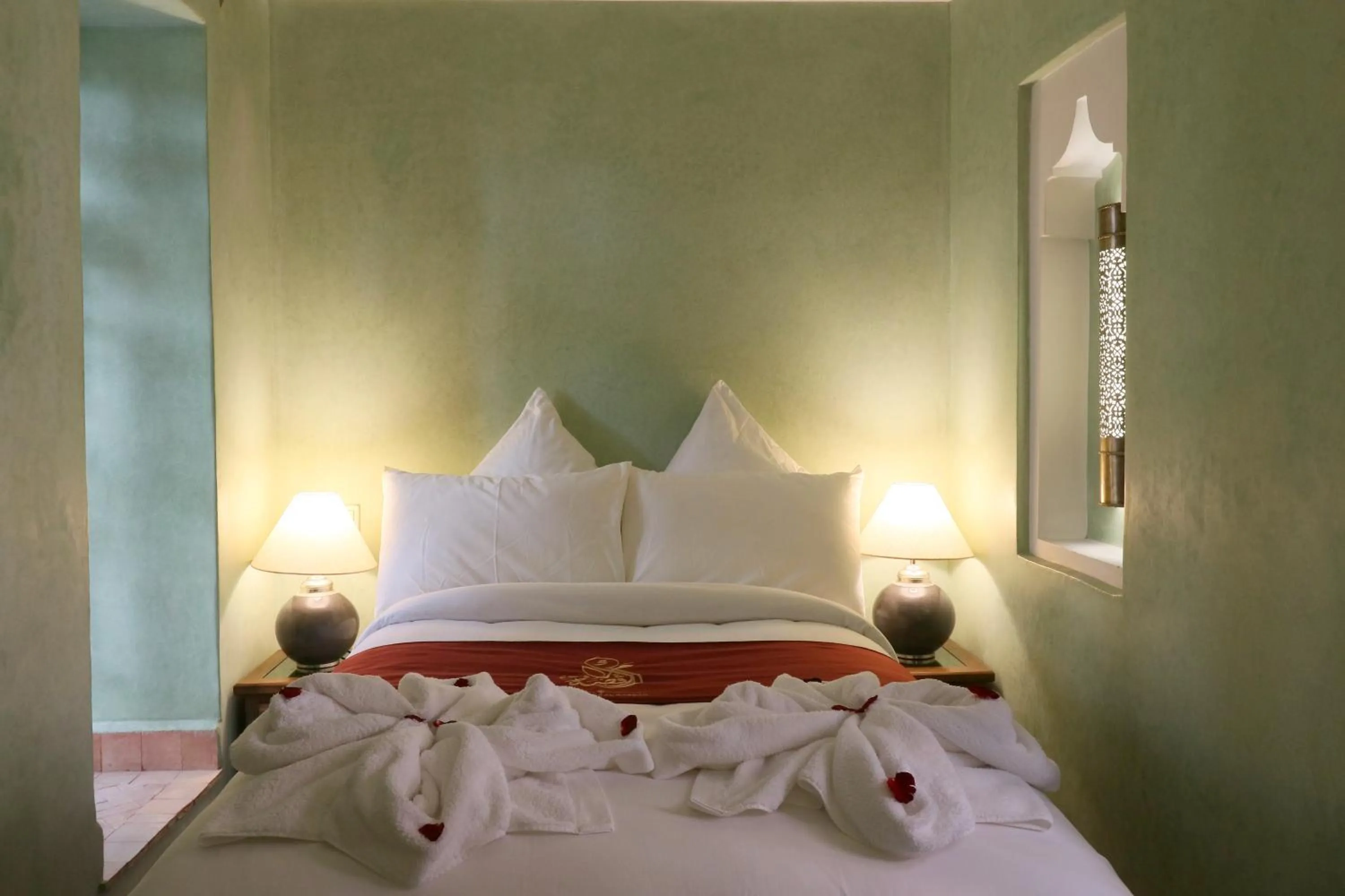 Bed in Riad Omara al Kasbah