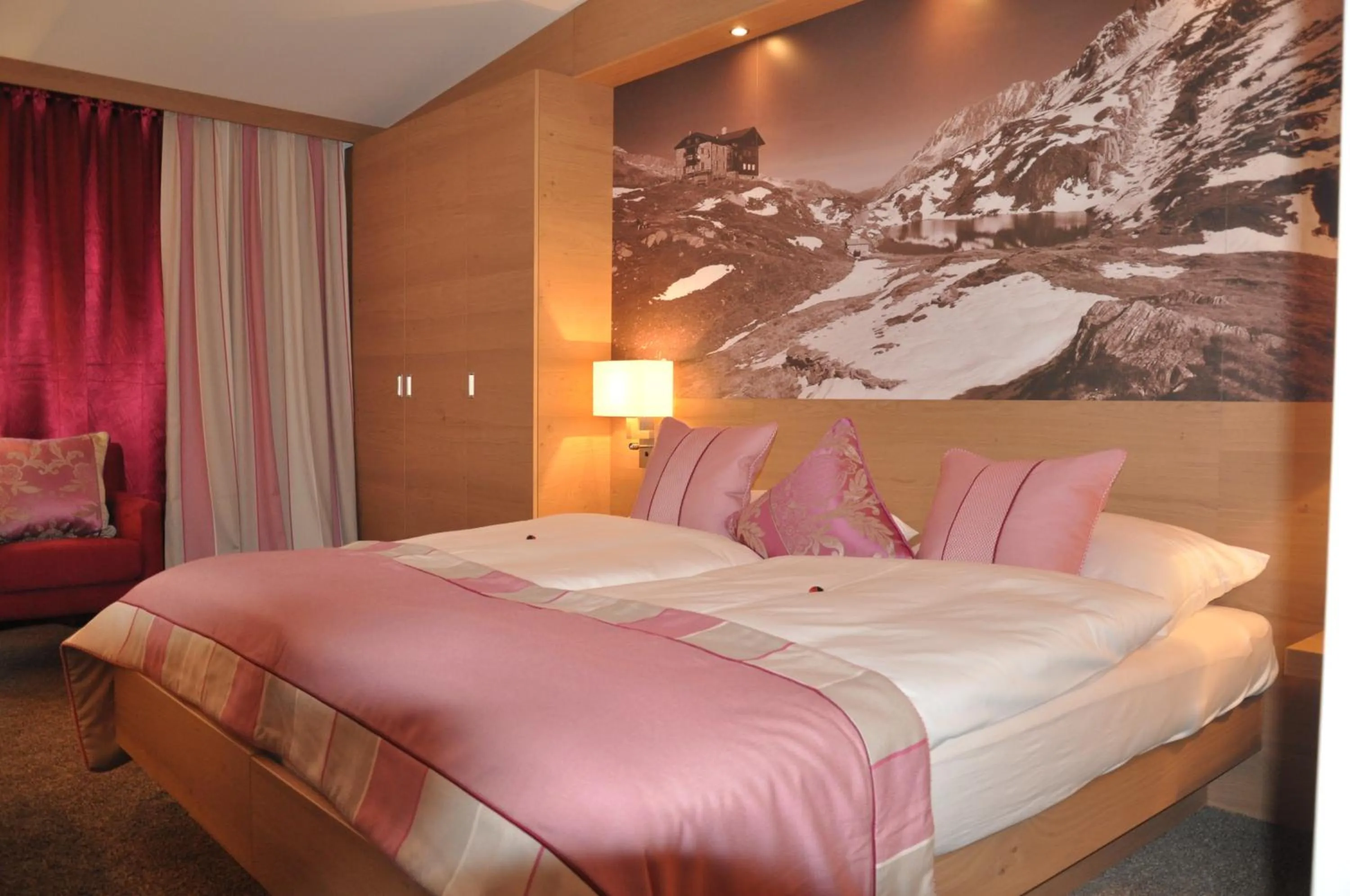 Photo of the whole room, Bed in Hotel Goldener Adler Wattens