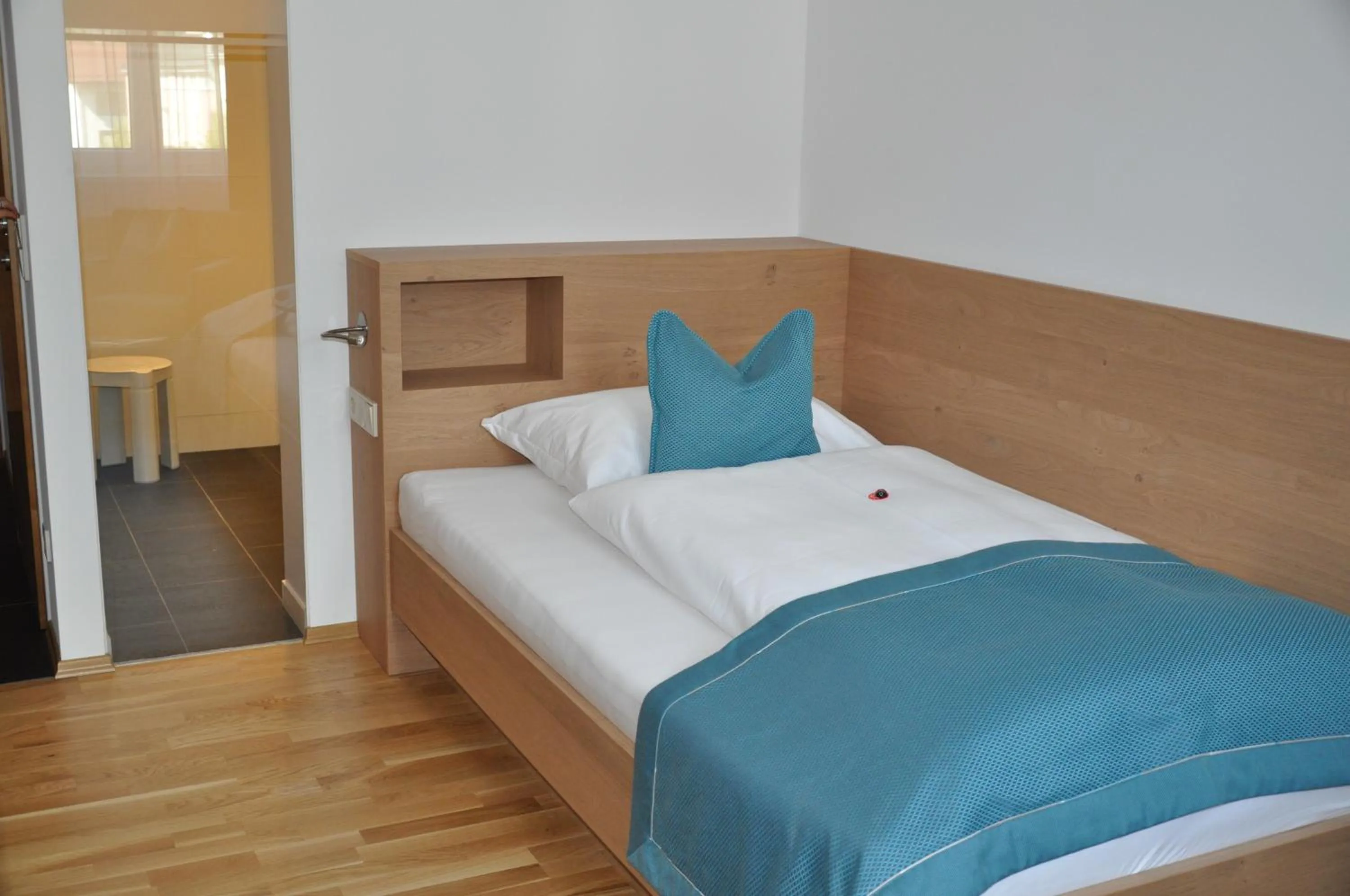 Bed in Hotel Goldener Adler Wattens