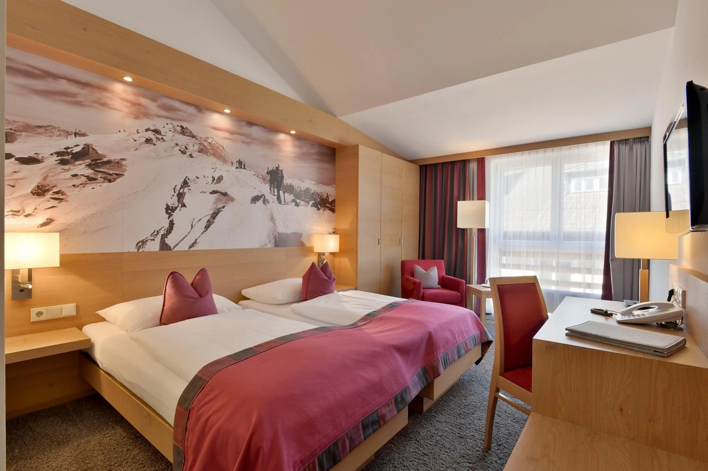 Photo of the whole room, Bed in Hotel Goldener Adler Wattens