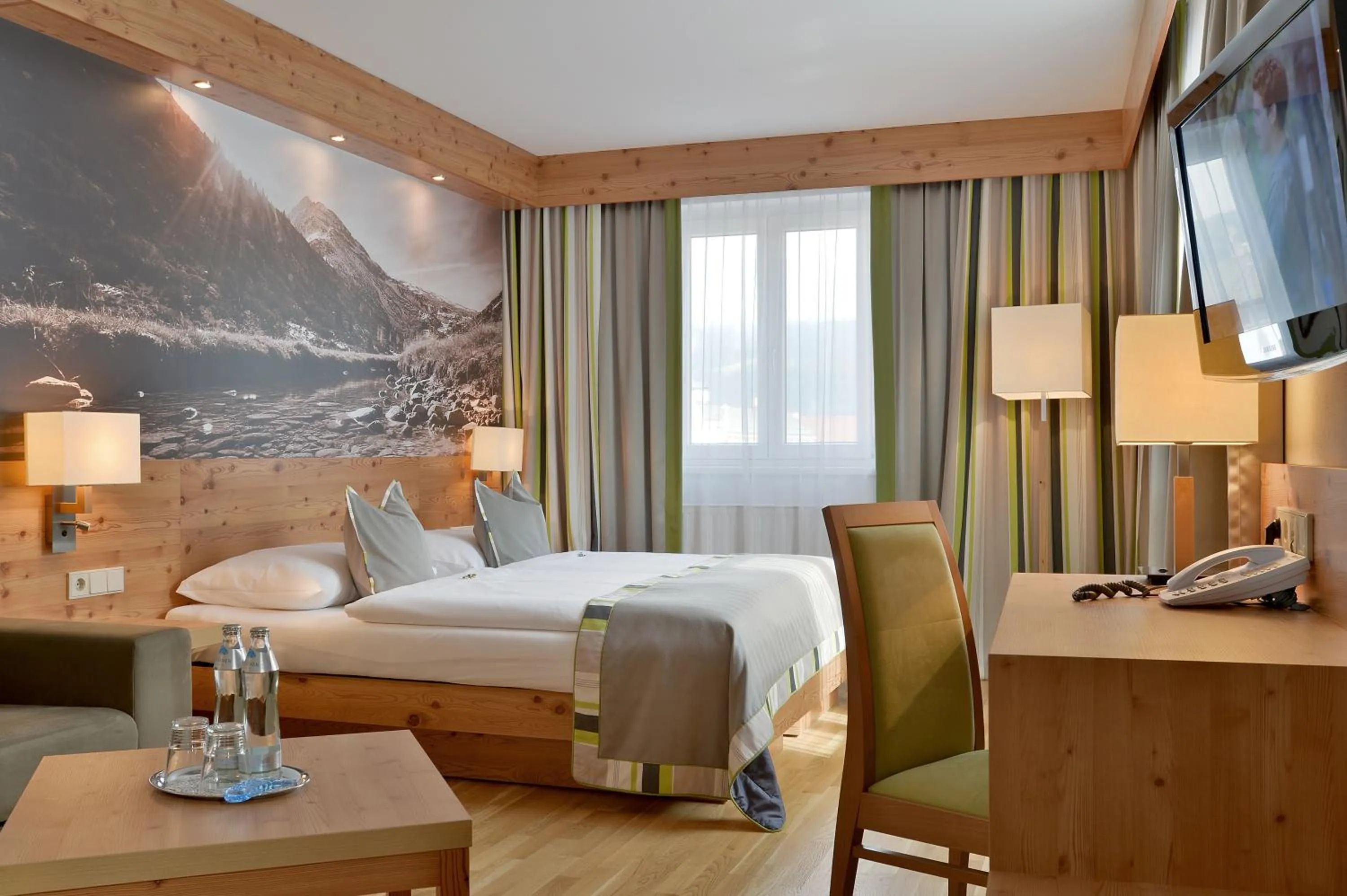 Photo of the whole room, Bed in Hotel Goldener Adler Wattens
