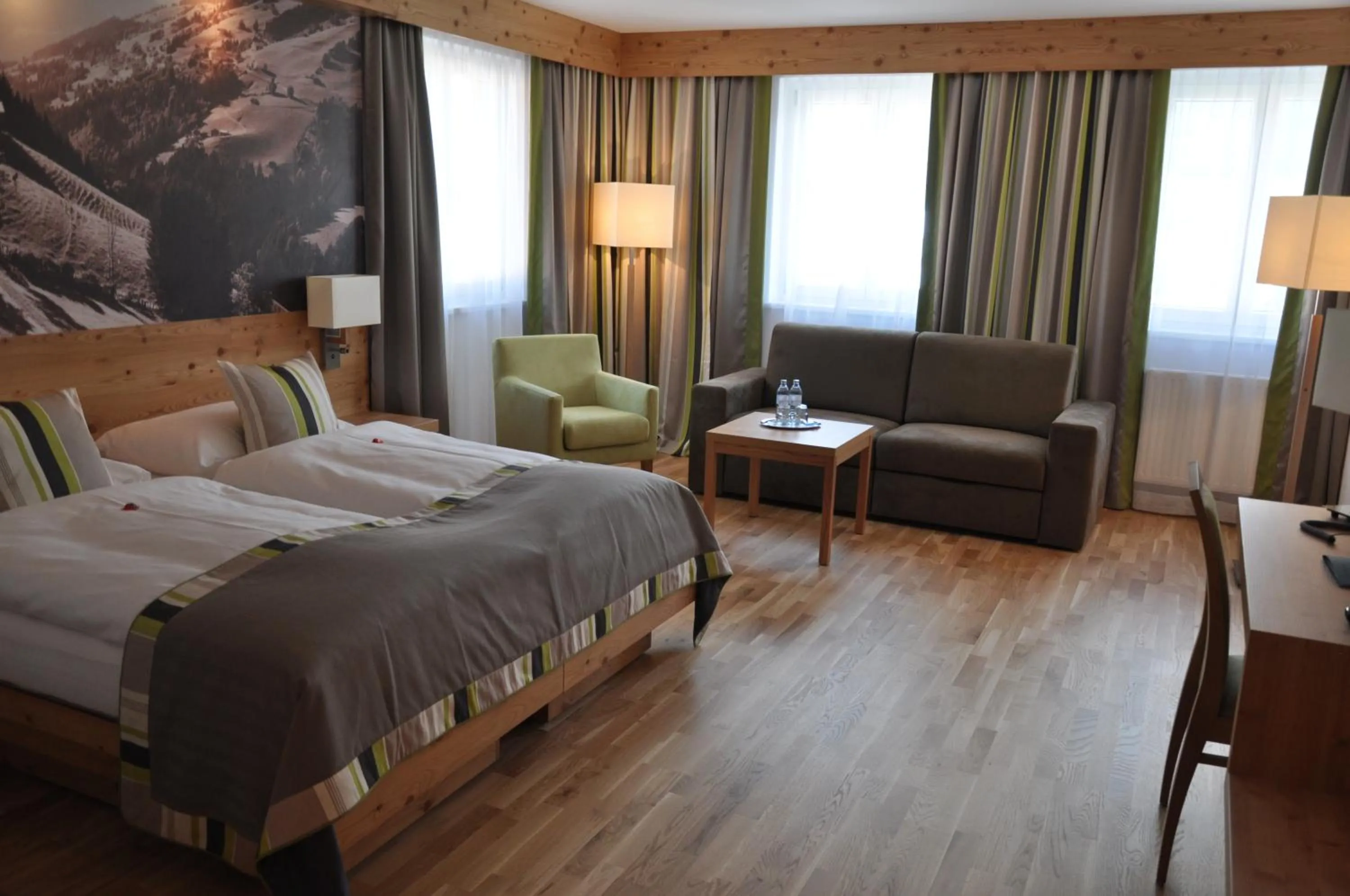 Photo of the whole room, Bed in Hotel Goldener Adler Wattens