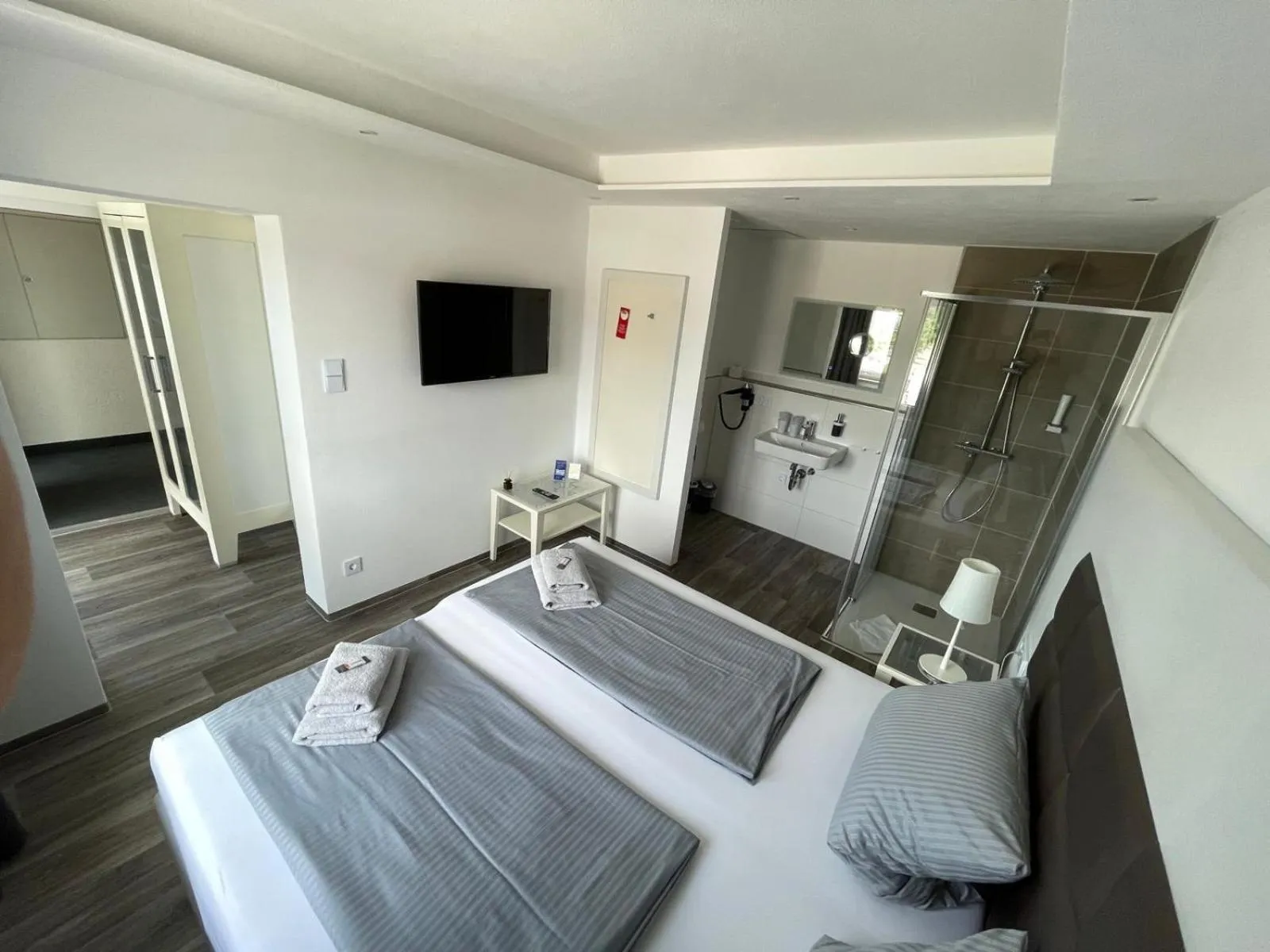 Shower, Bed in Hotel Leitner