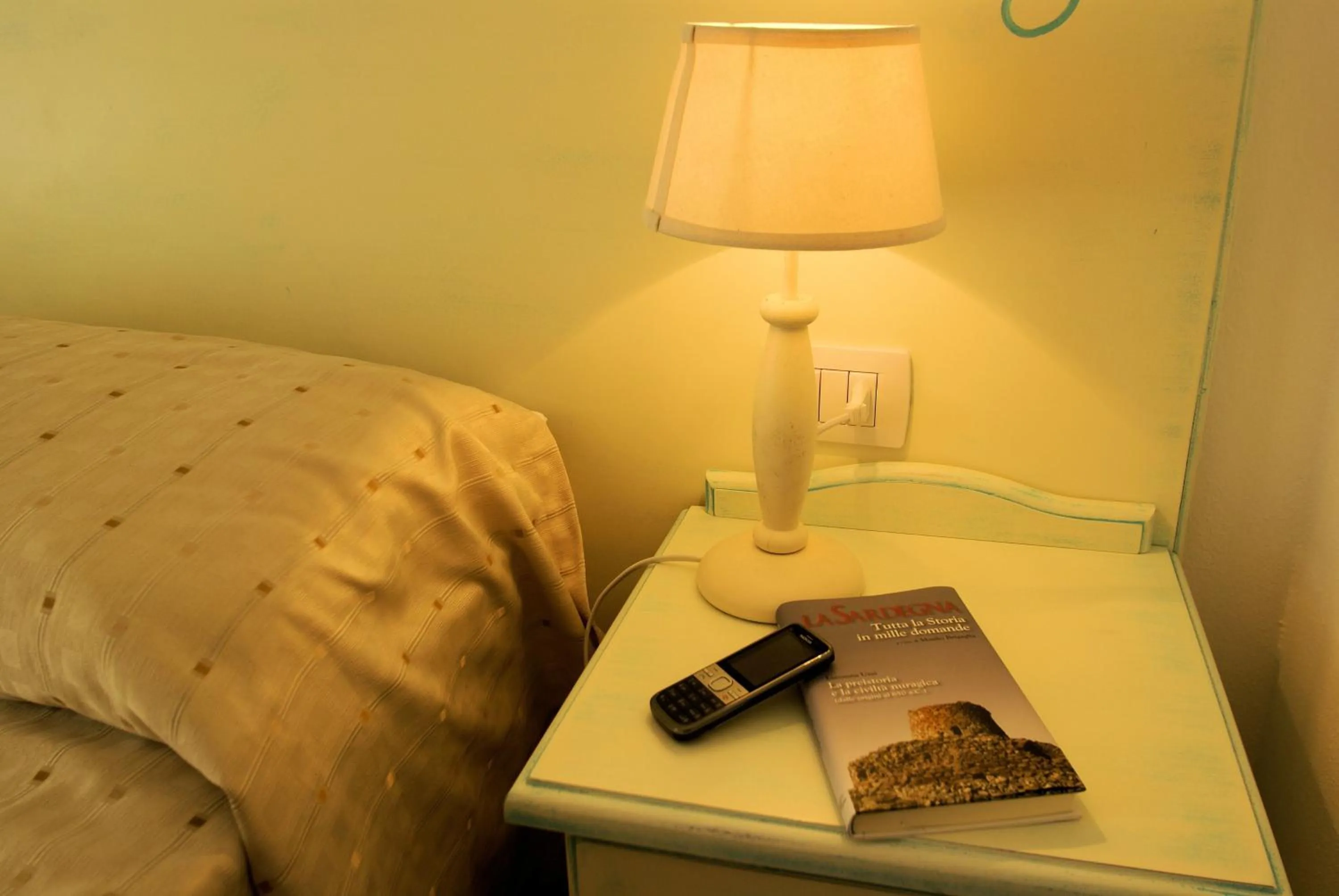 Decorative detail, Bed in Sa Fiorida Appartamenti