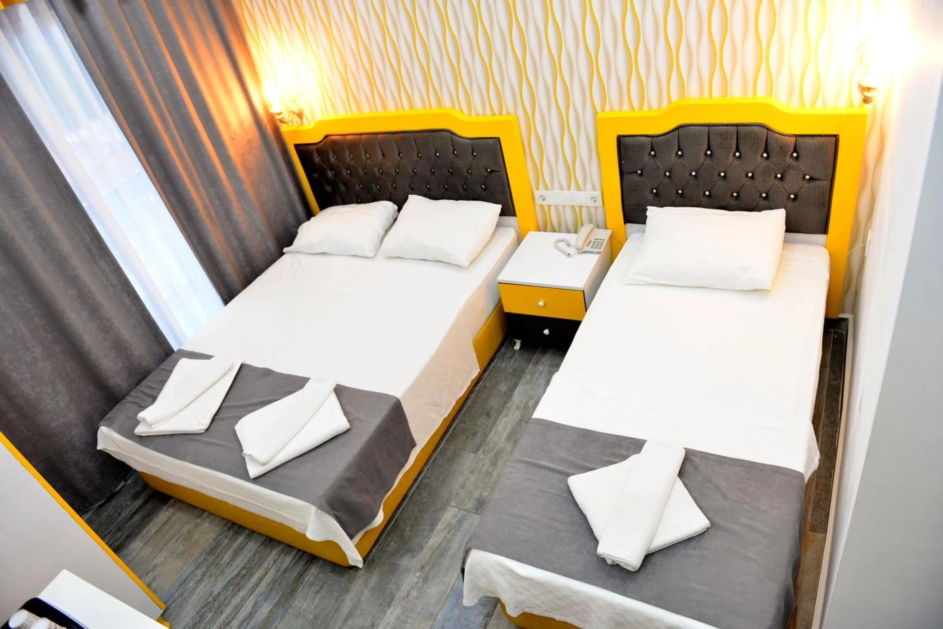 Bed in Yade Luxe Hotel