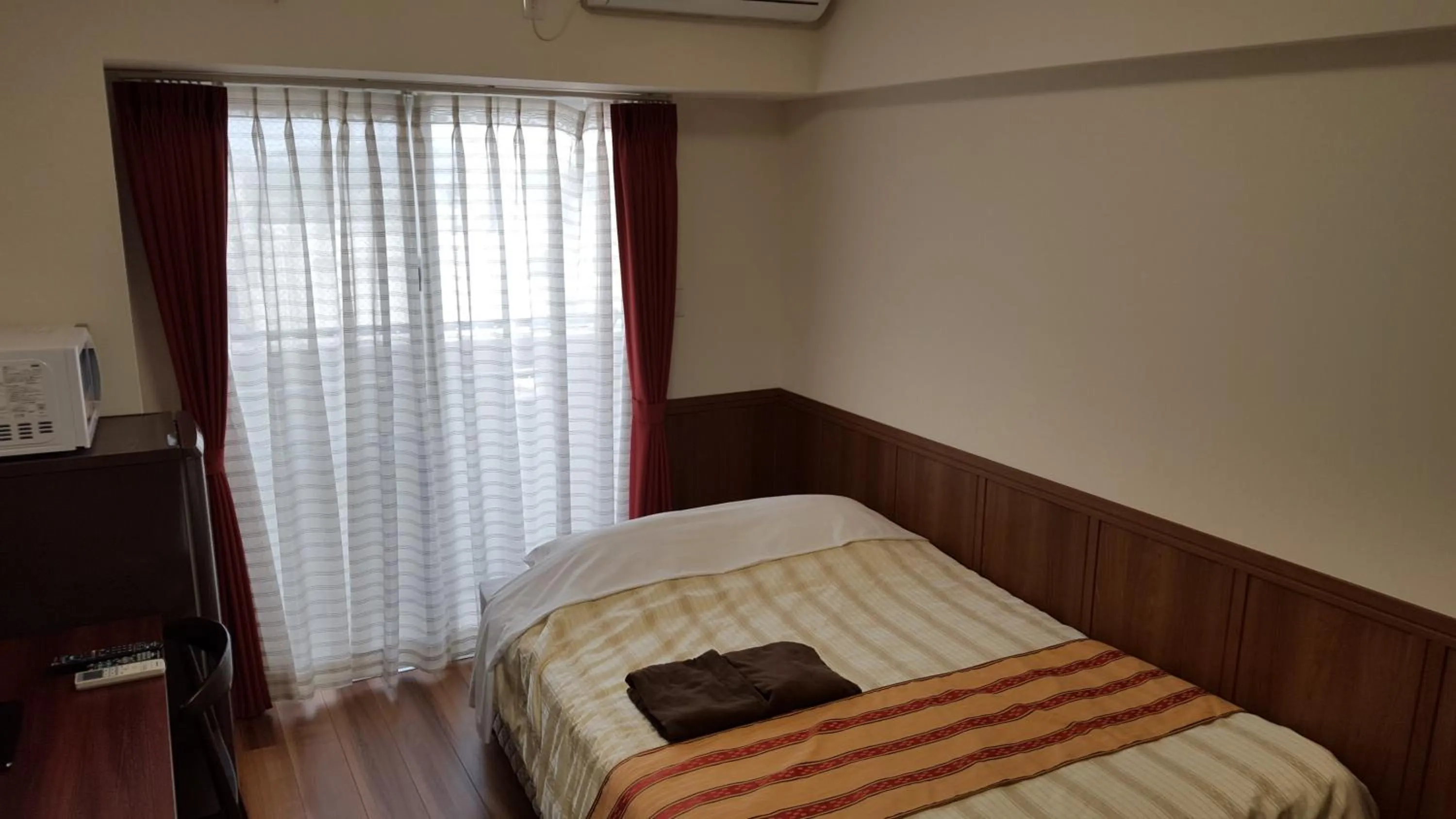 Bed in Hotel Peacely In Miyakojima Nexus