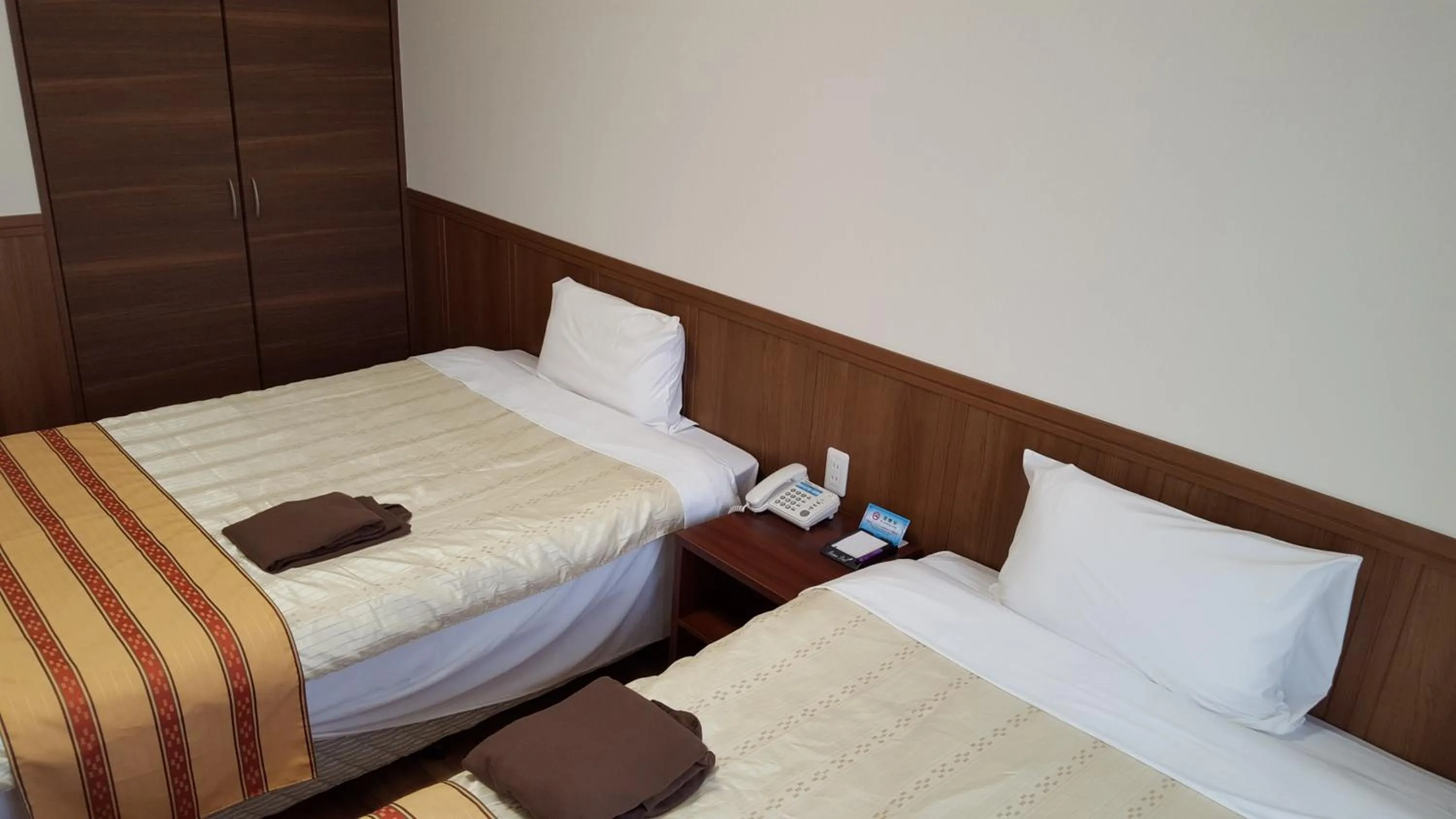 Bed in Hotel Peacely In Miyakojima Nexus