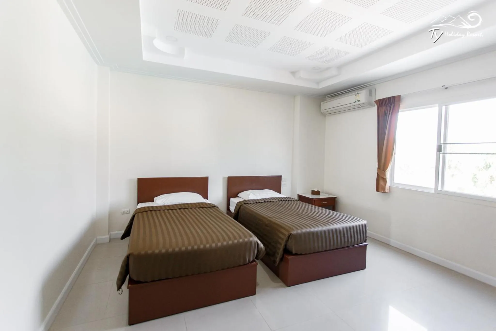 Bed in TY Holiday Resort