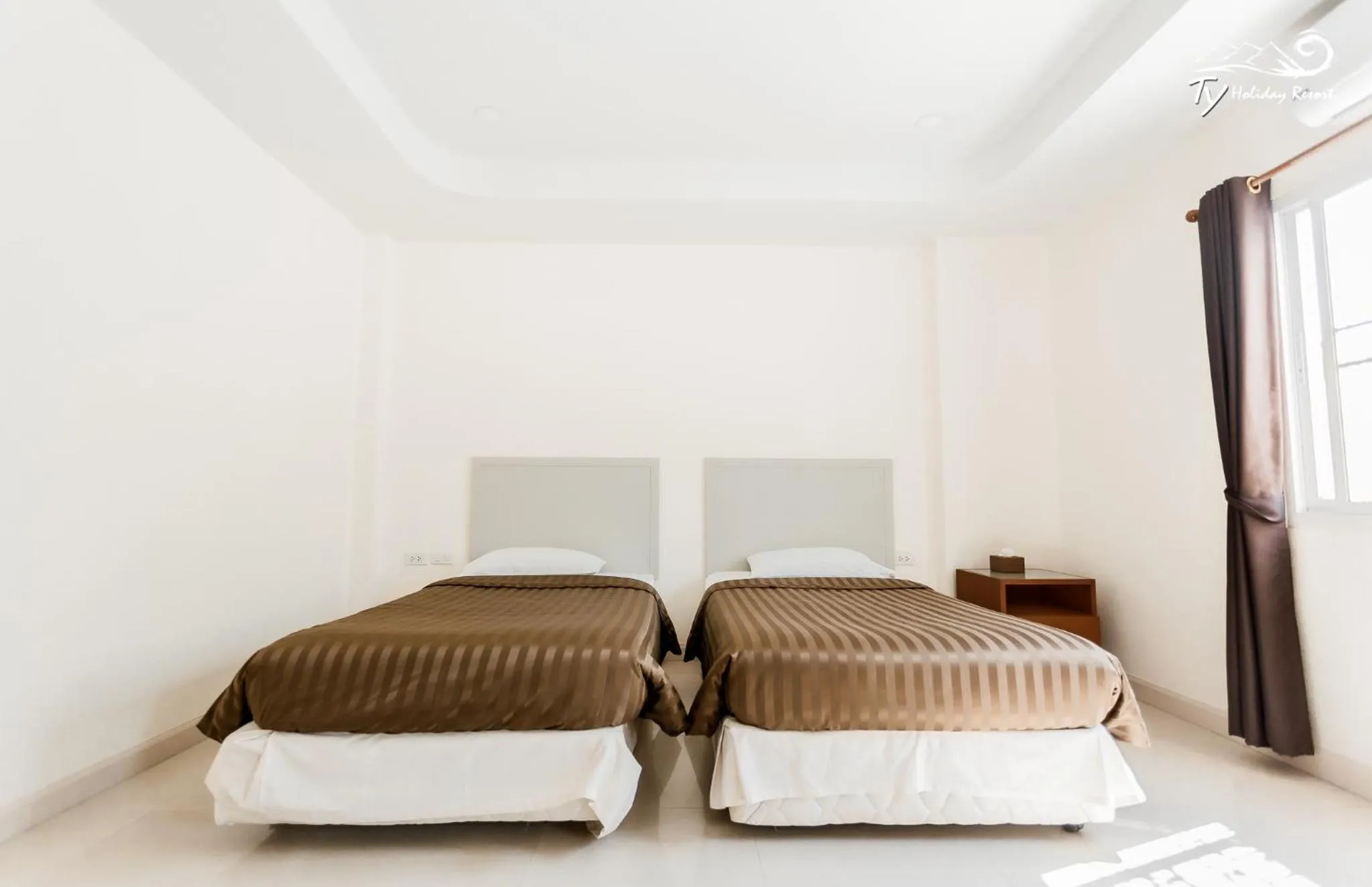 Bed in TY Holiday Resort