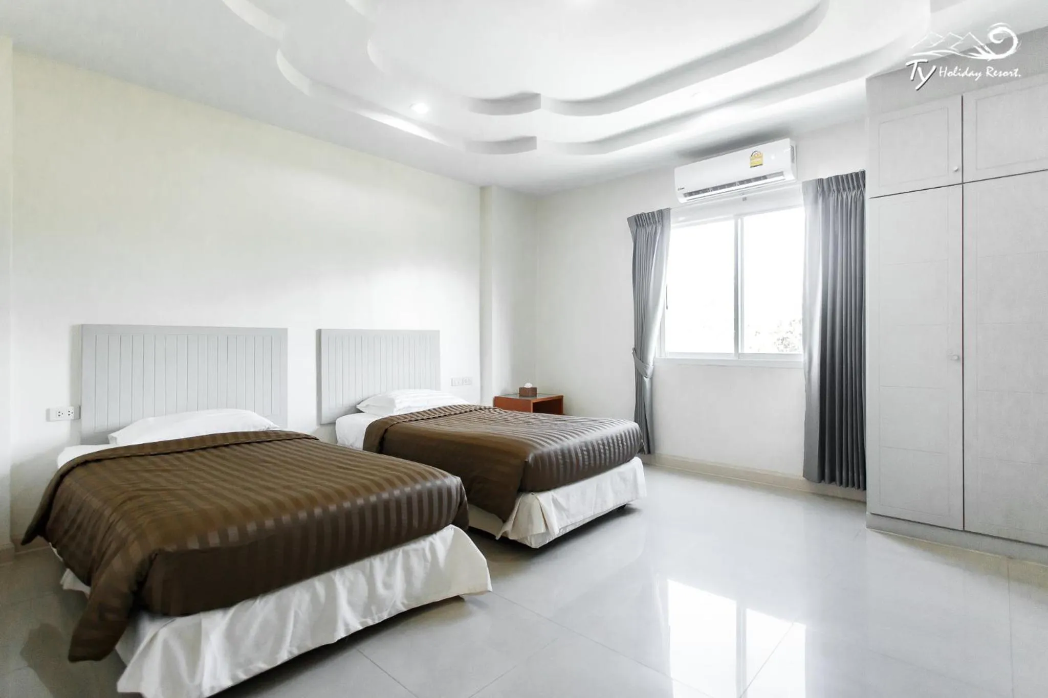 Bed in TY Holiday Resort