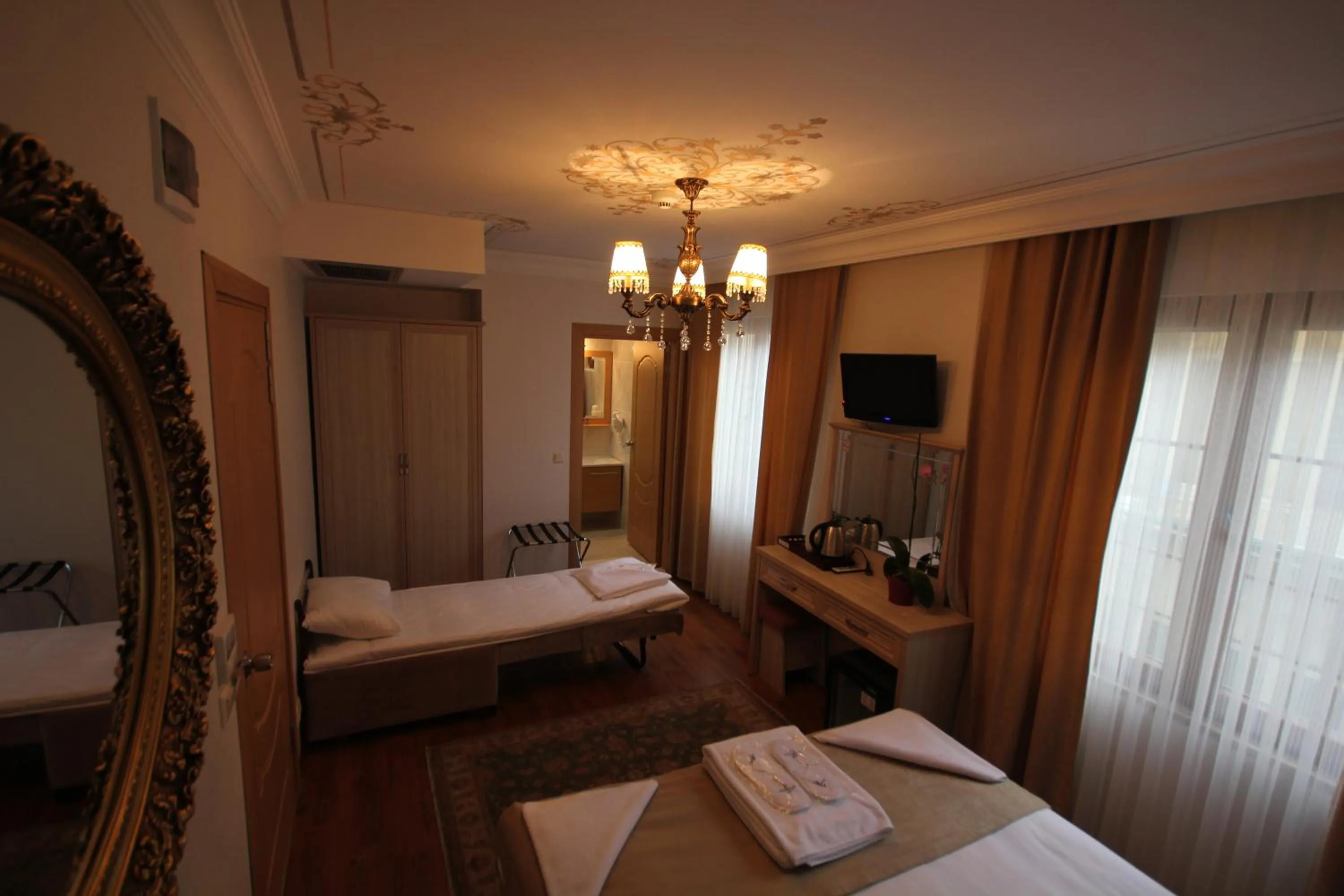 Bed in Sultans Royal Hotel