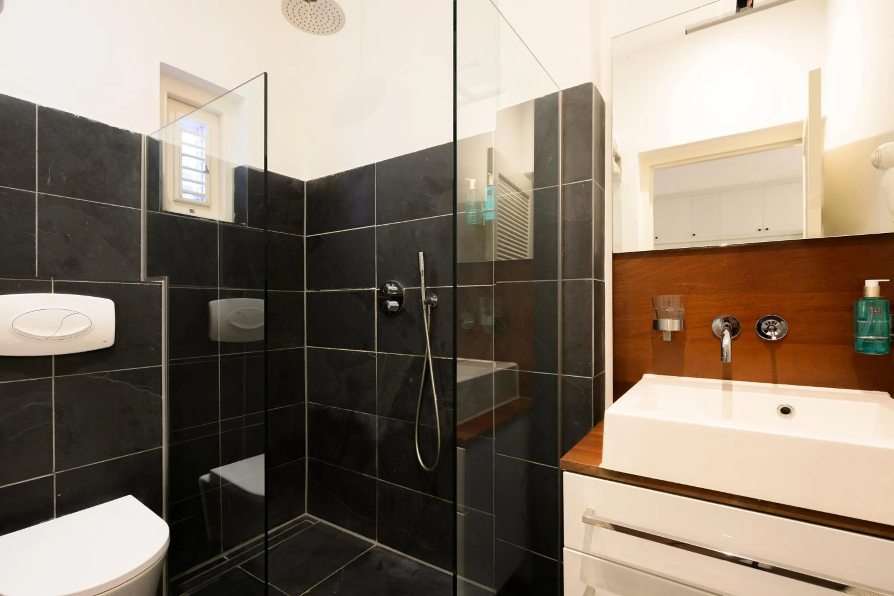 Bathroom in Scuba Lodge & Suites