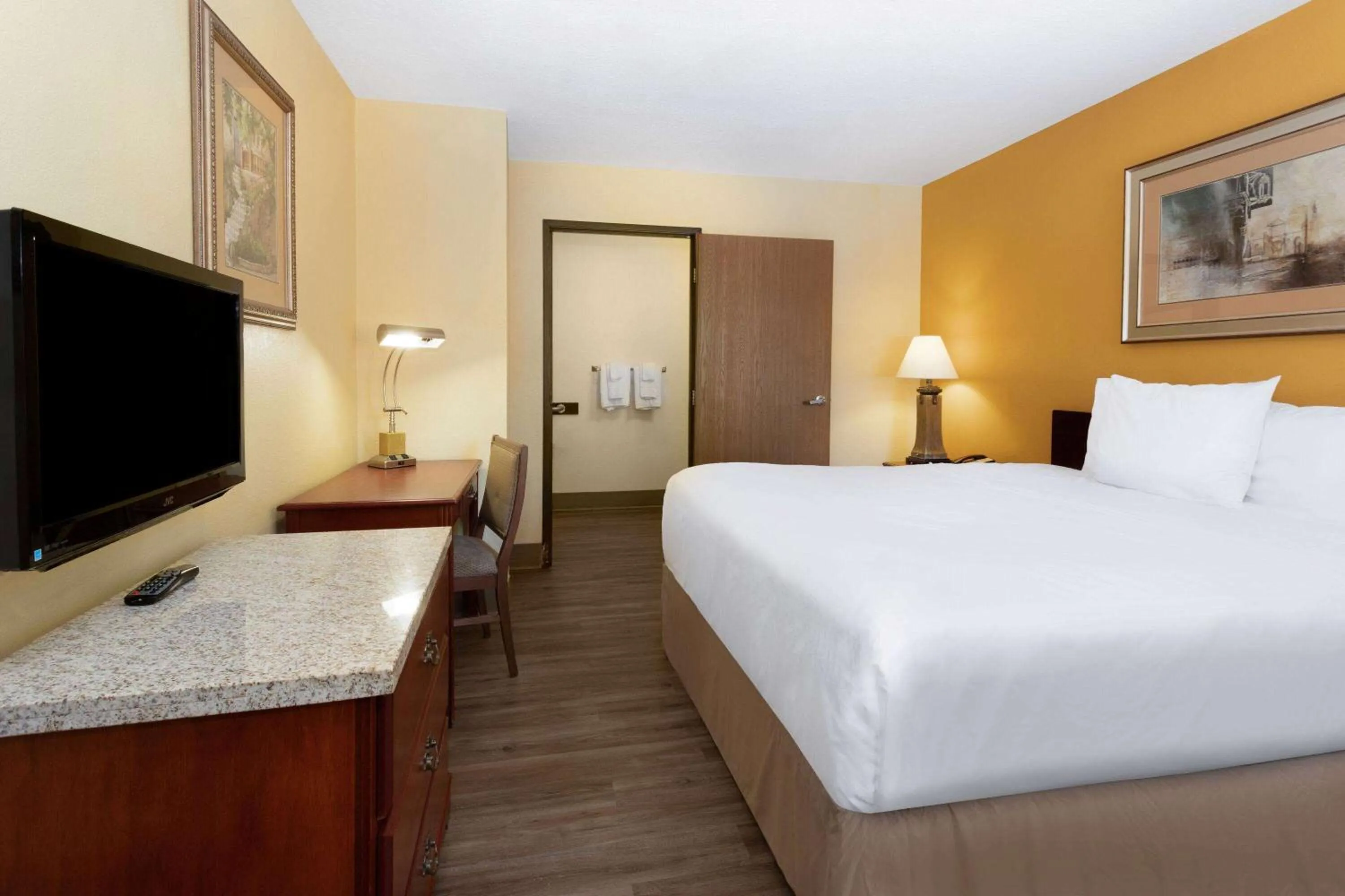 Shower, TV/Entertainment Center in Travelodge by Wyndham Albuquerque East