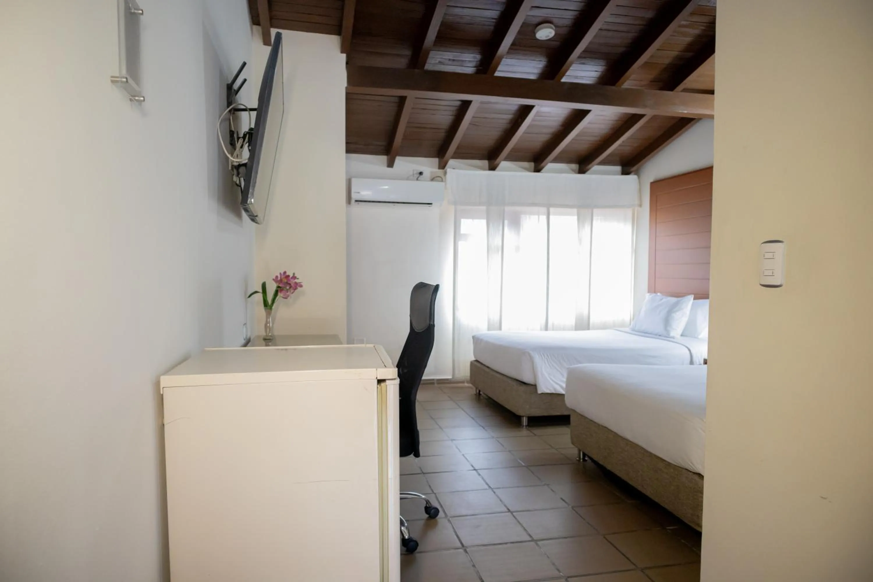 Bed in Hotel Faranda Bolivar Cucuta, a member of Radisson Individuals