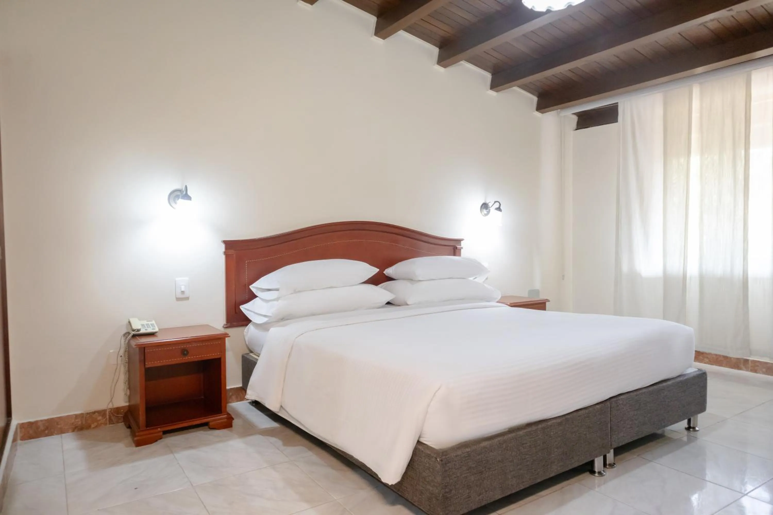 Bed in Hotel Faranda Bolivar Cucuta, a member of Radisson Individuals