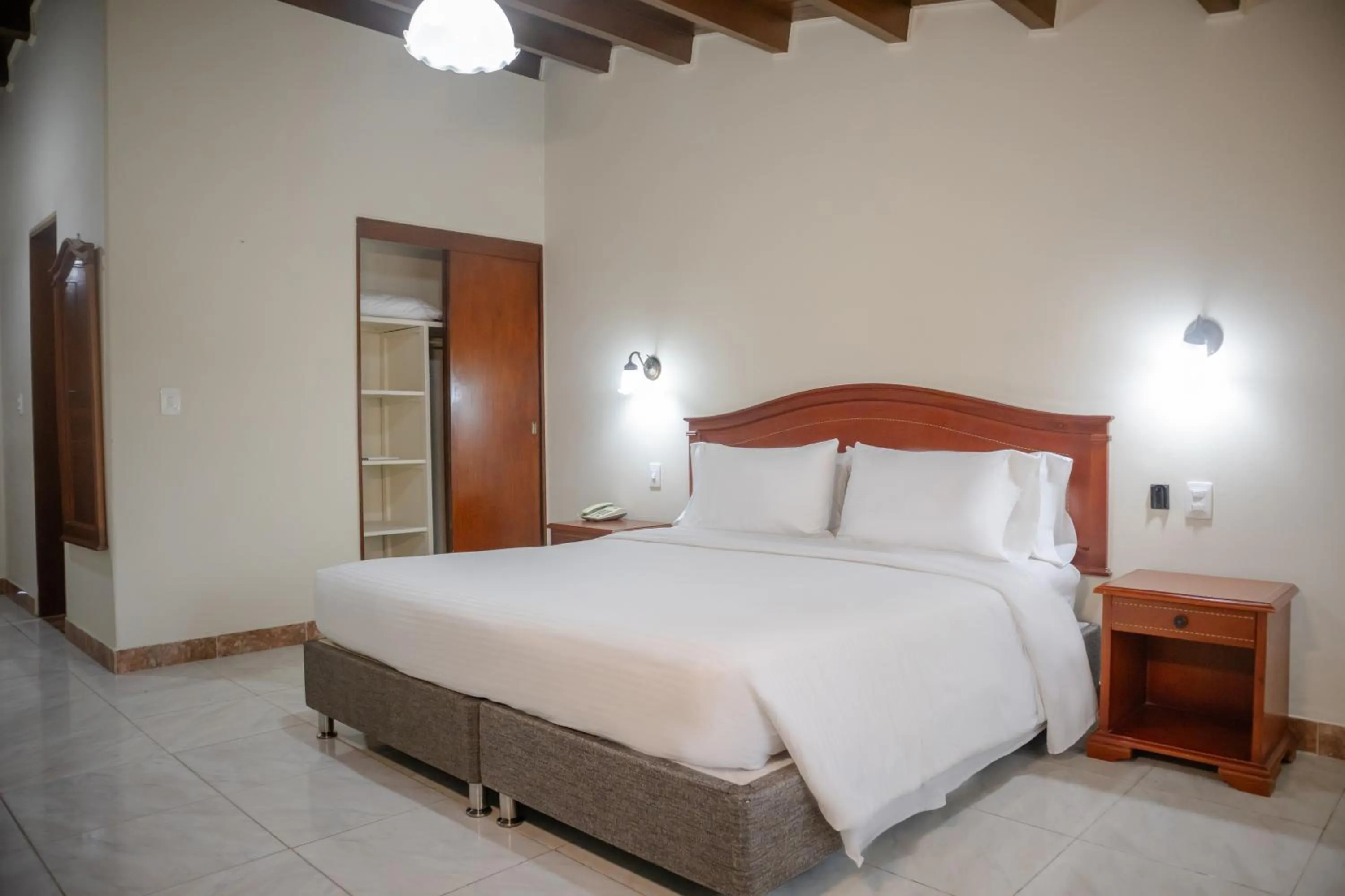 Bed in Hotel Faranda Bolivar Cucuta, a member of Radisson Individuals