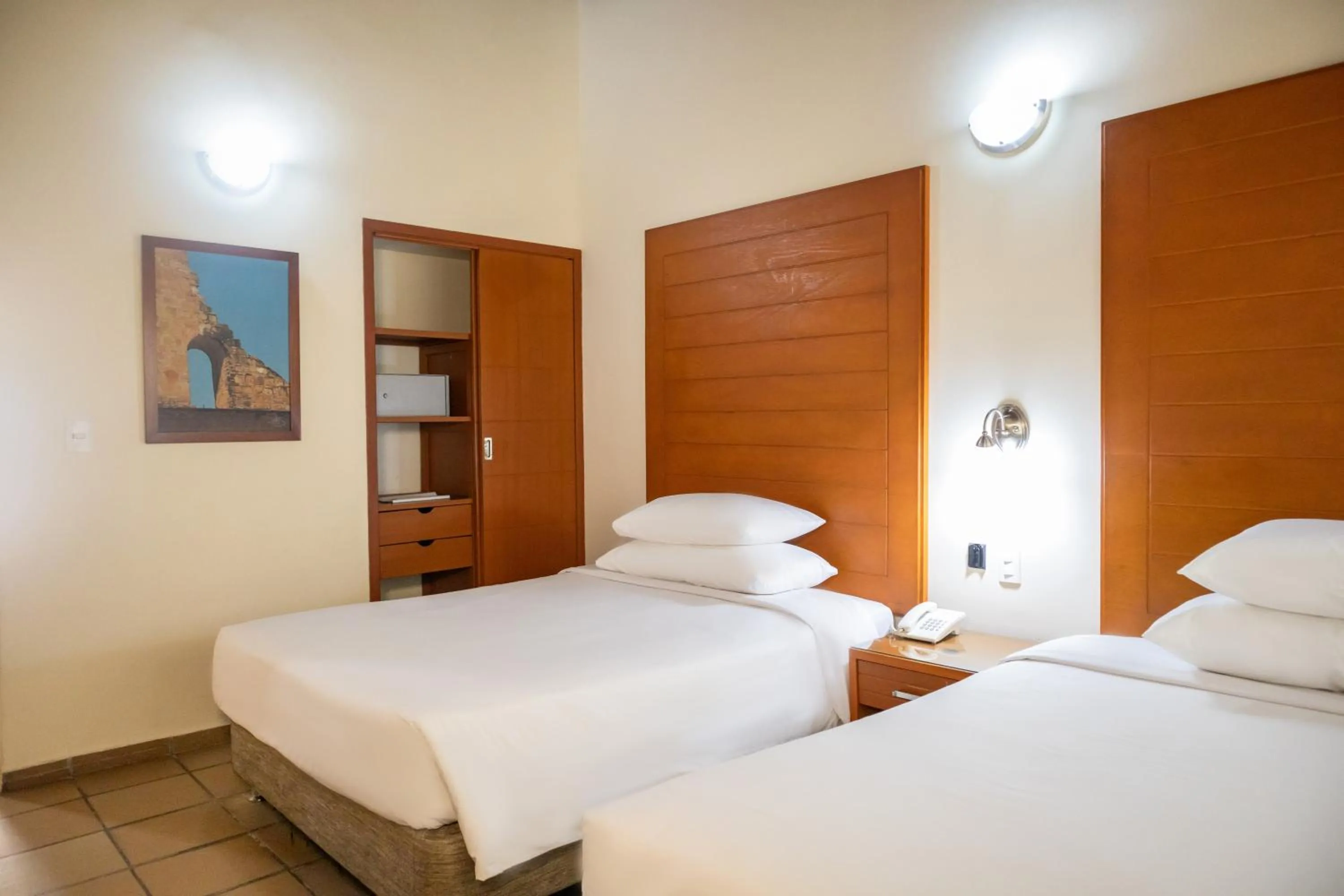Bed in Hotel Faranda Bolivar Cucuta, a member of Radisson Individuals