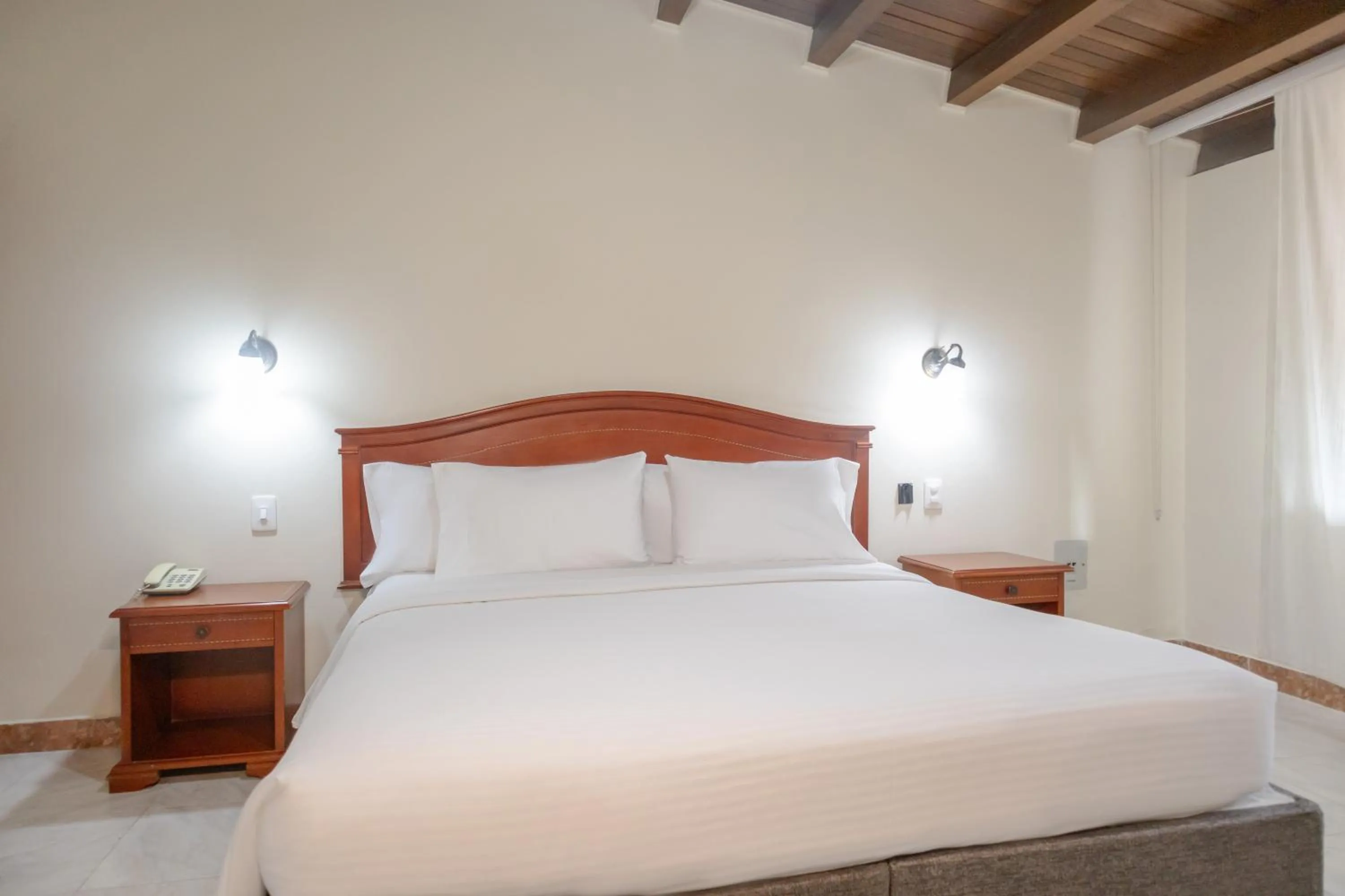 Bed in Hotel Faranda Bolivar Cucuta, a member of Radisson Individuals