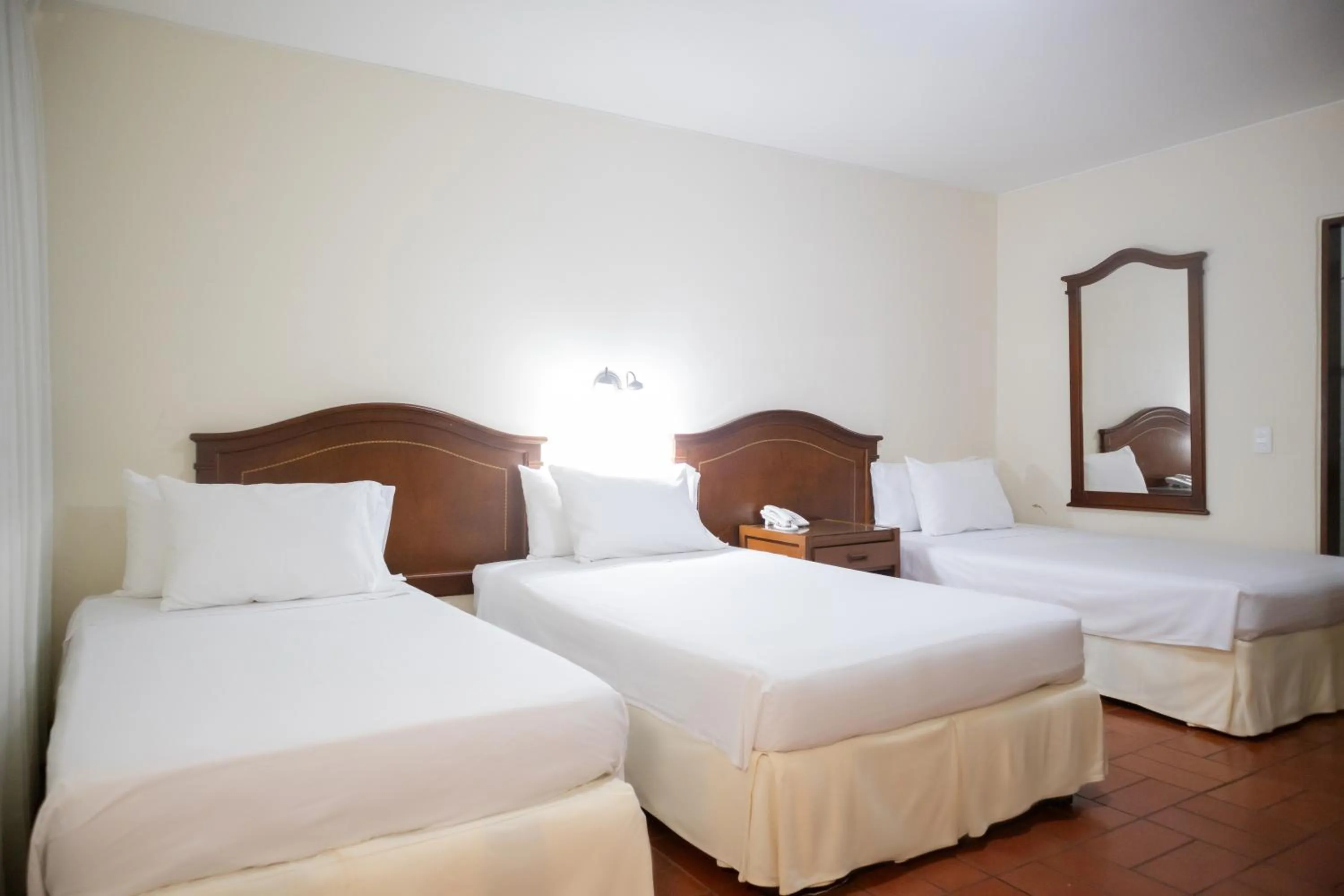 Bed in Hotel Faranda Bolivar Cucuta, a member of Radisson Individuals