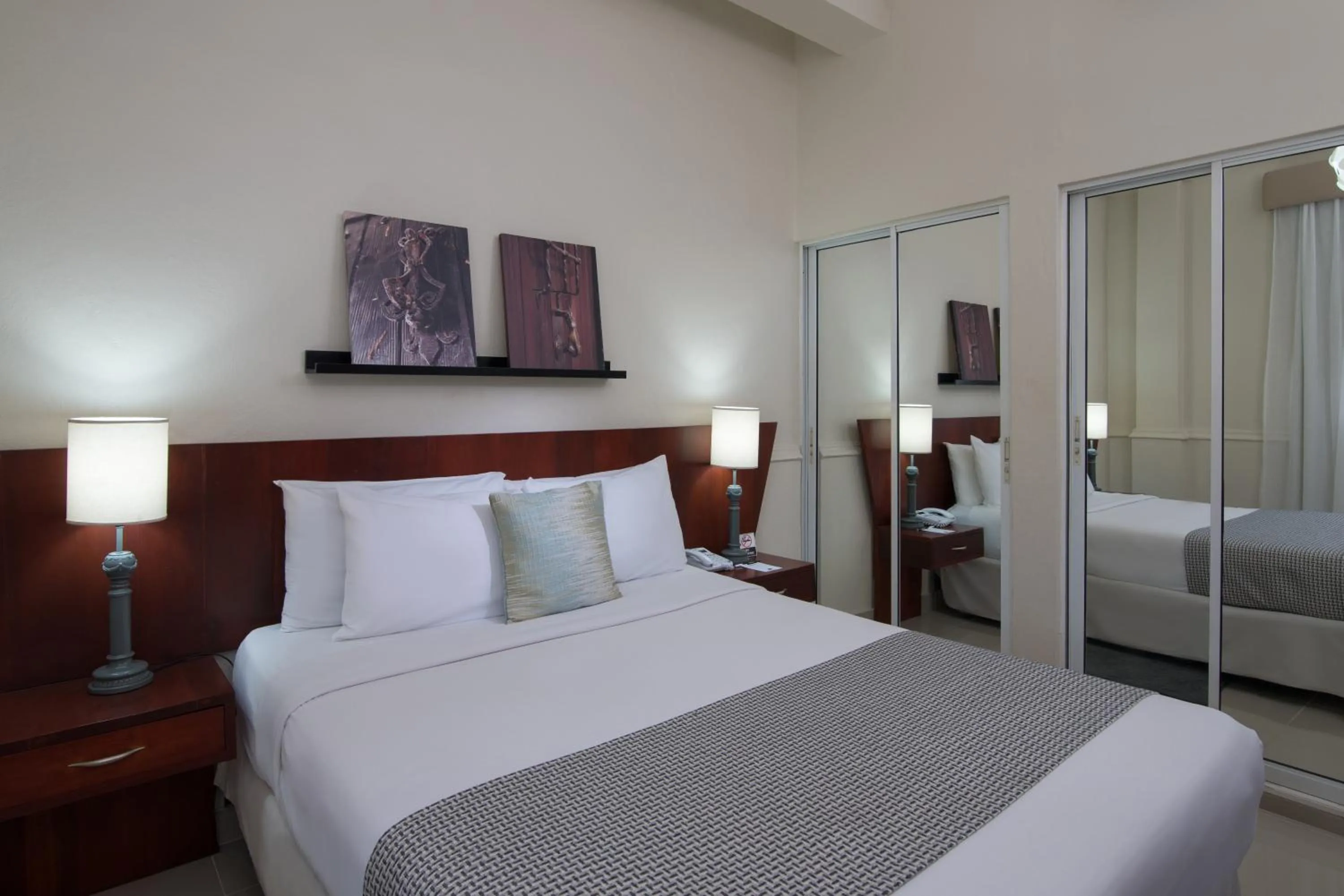 Bed in Hodelpa Caribe Colonial