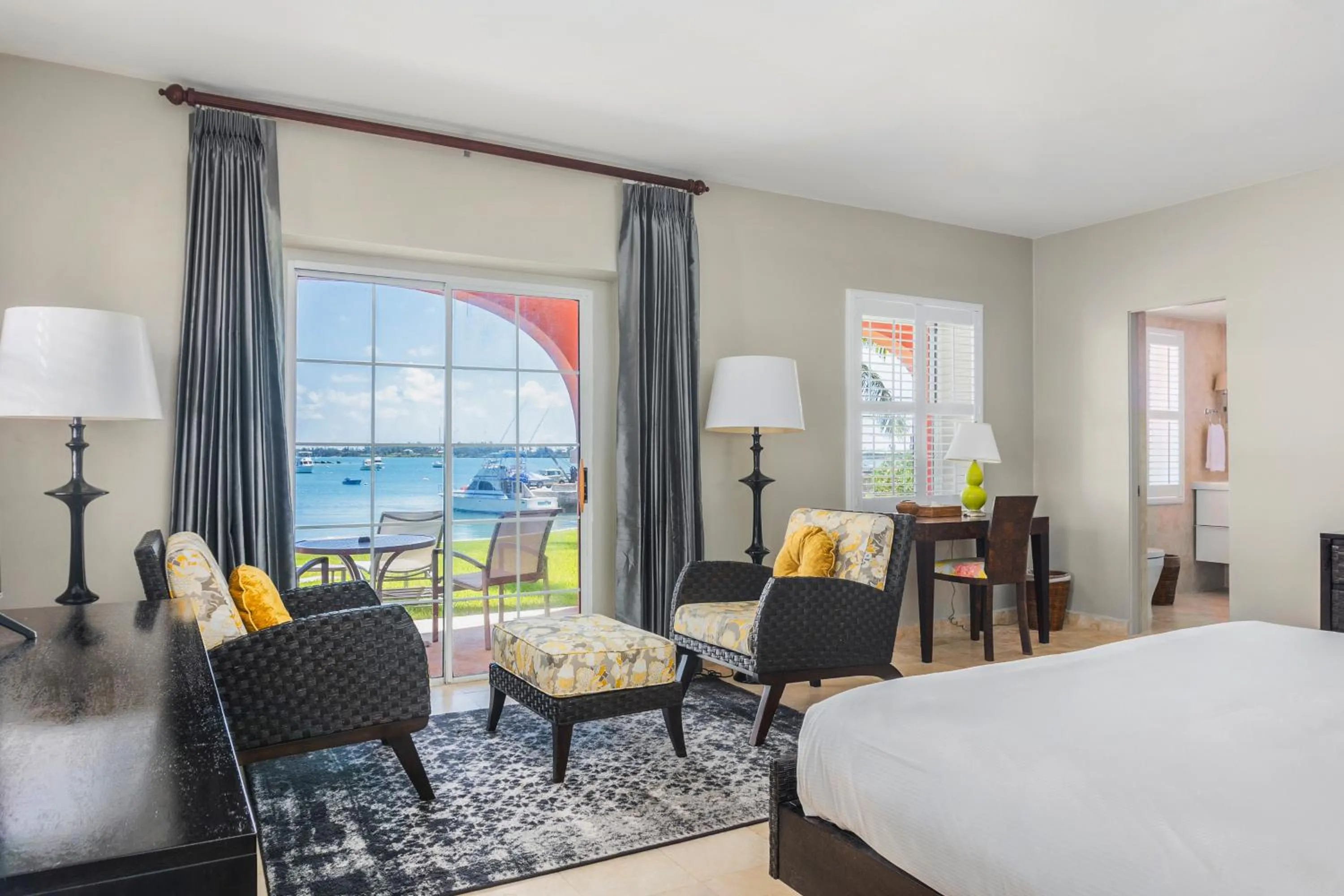 Seating area, Bed in Cambridge Beaches Resort and Spa