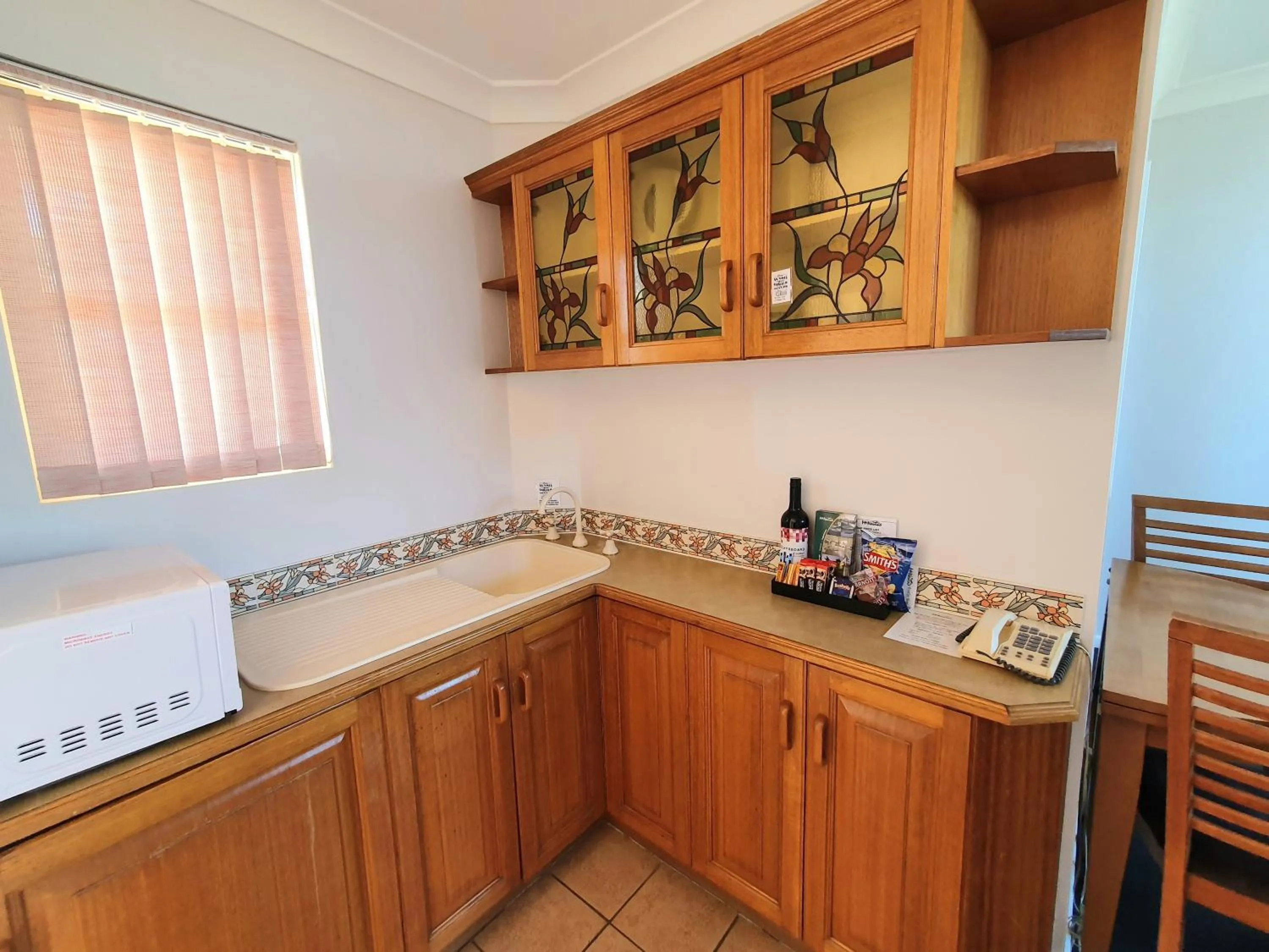 Kitchen or kitchenette in McNevins Maryborough Motel
