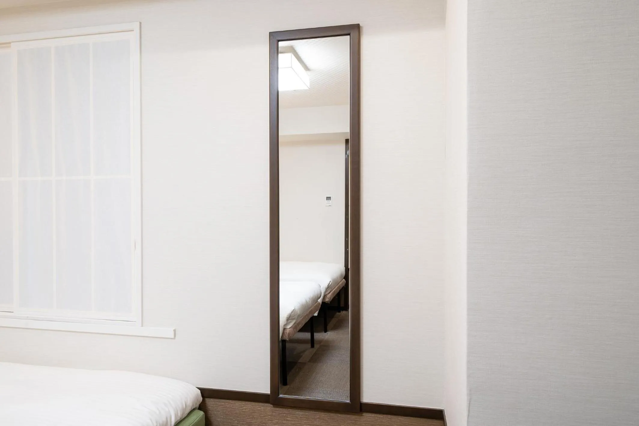 Bed in Hotel Sunlite Shinjuku