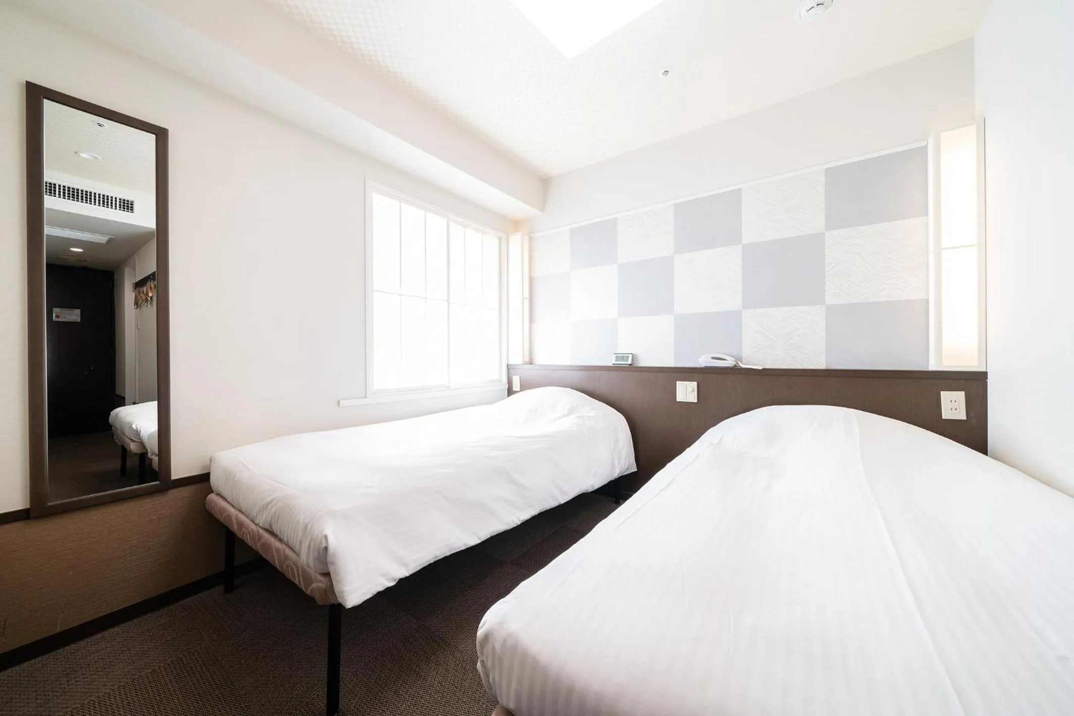 Photo of the whole room, Bed in Hotel Sunlite Shinjuku