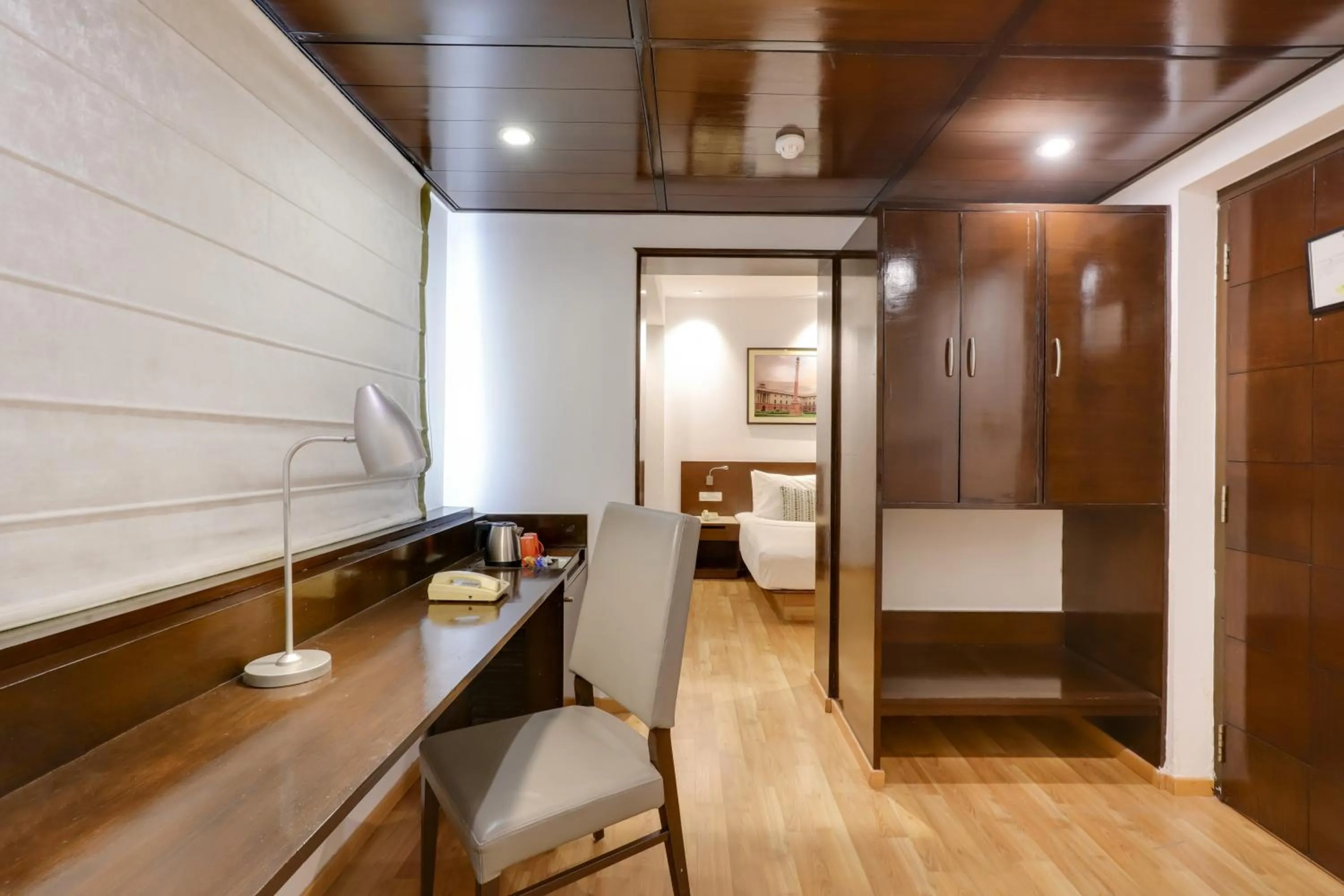 Seating area, Bed in Lemon Tree Premier 1, Gurugram