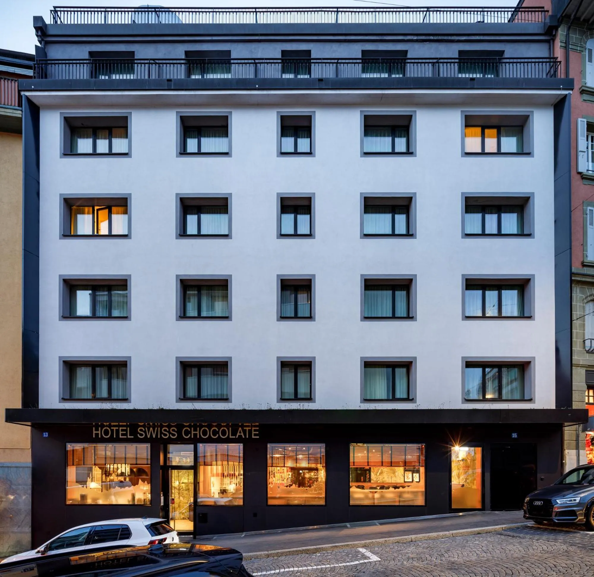 Property building in Swiss Chocolate by Fassbind Lausanne
