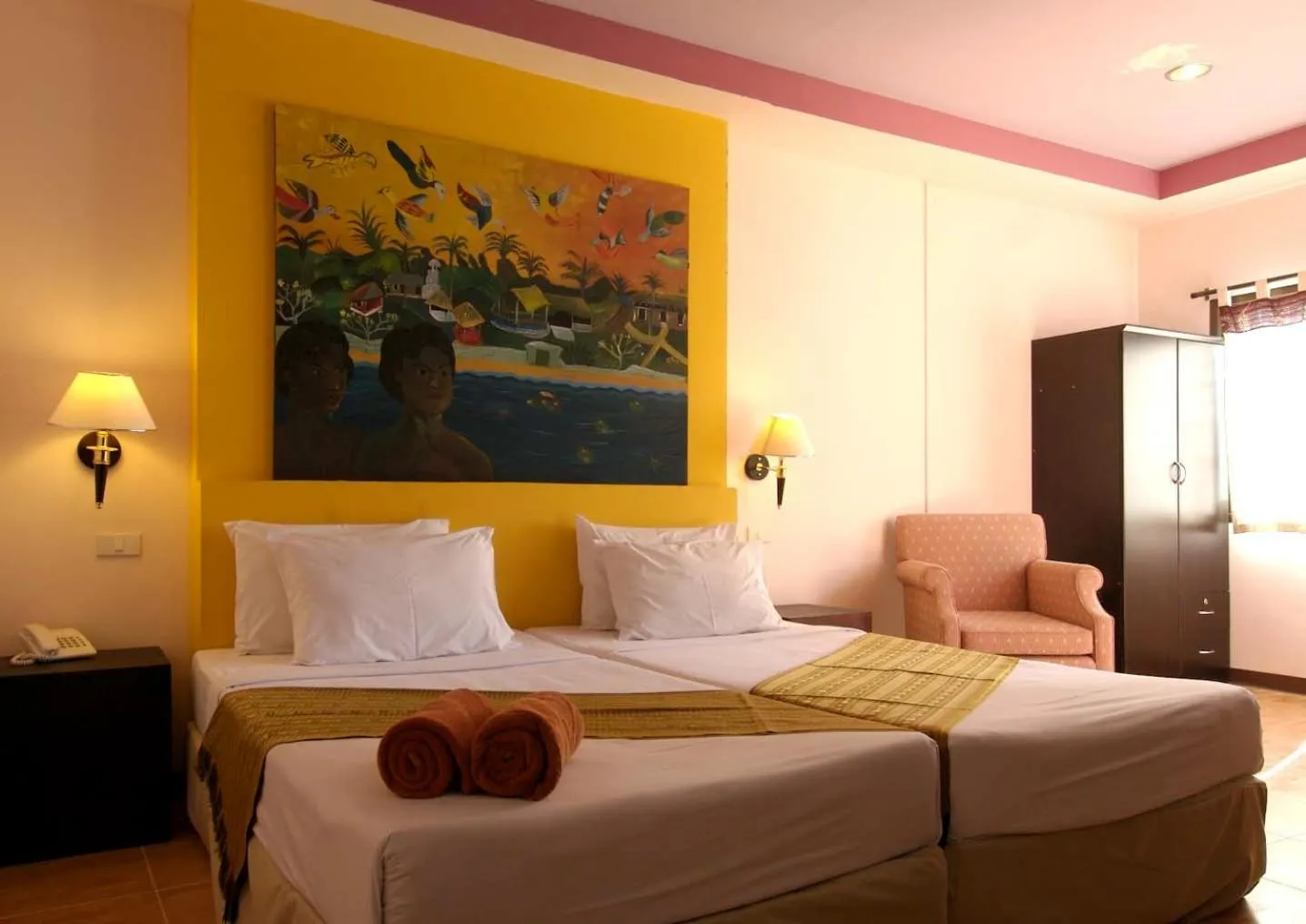 Bed in Koh Ngai Cliff Beach Resort