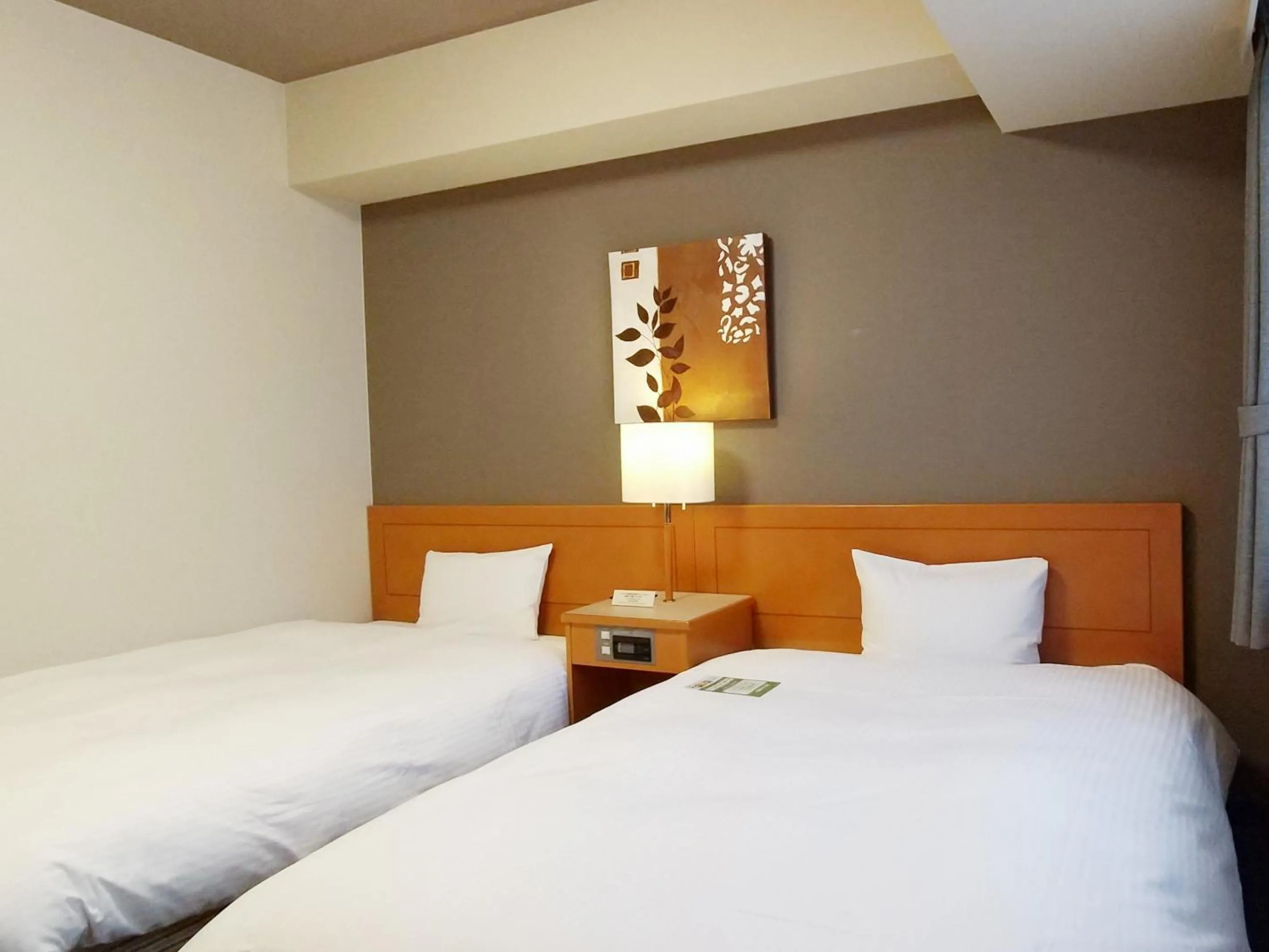 Photo of the whole room, Bed in Hotel Route-Inn Niigata Kencho-minami