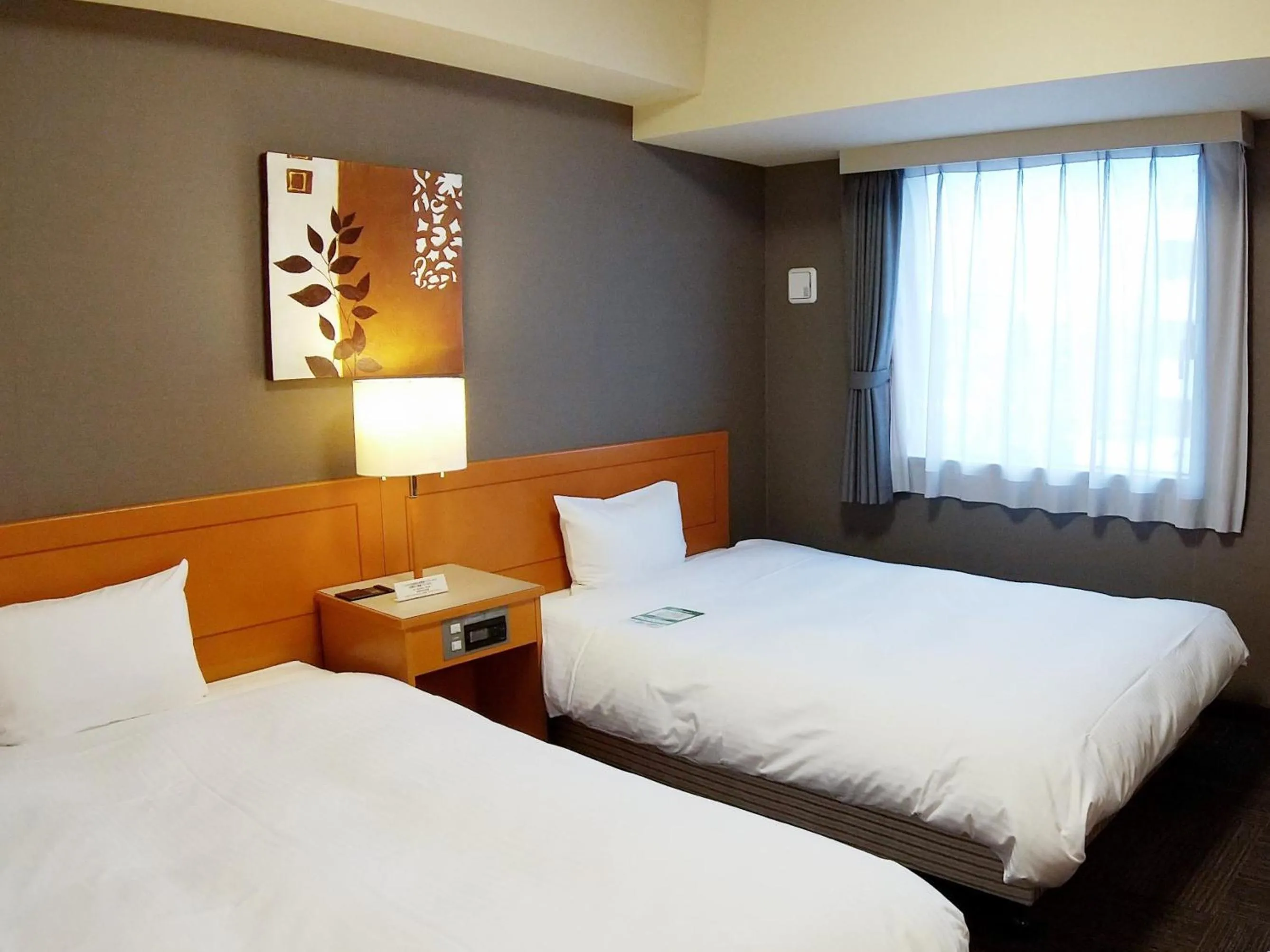 Photo of the whole room, Bed in Hotel Route-Inn Niigata Kencho-minami