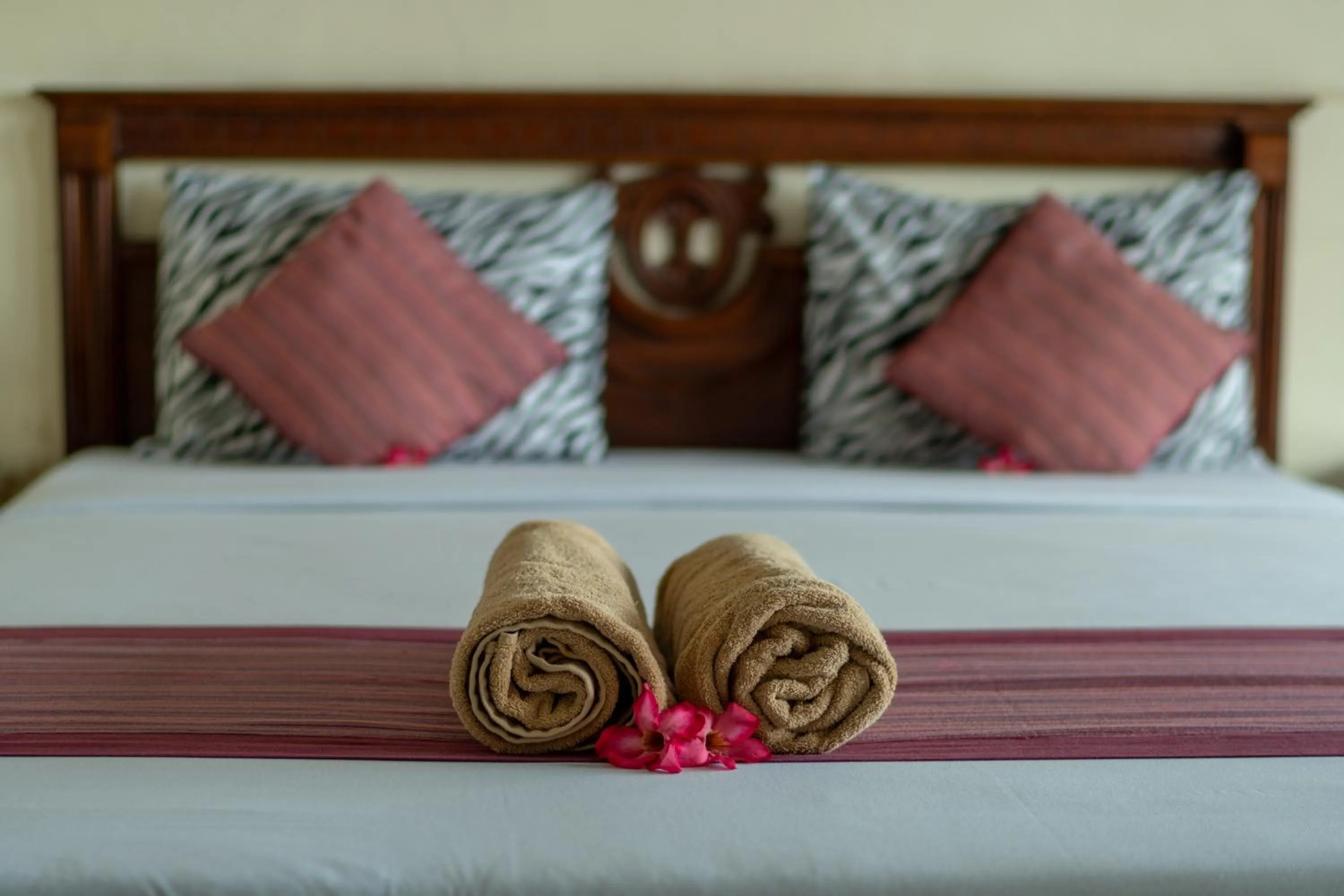 Bed in Warsa's Garden Bungalow and Spa