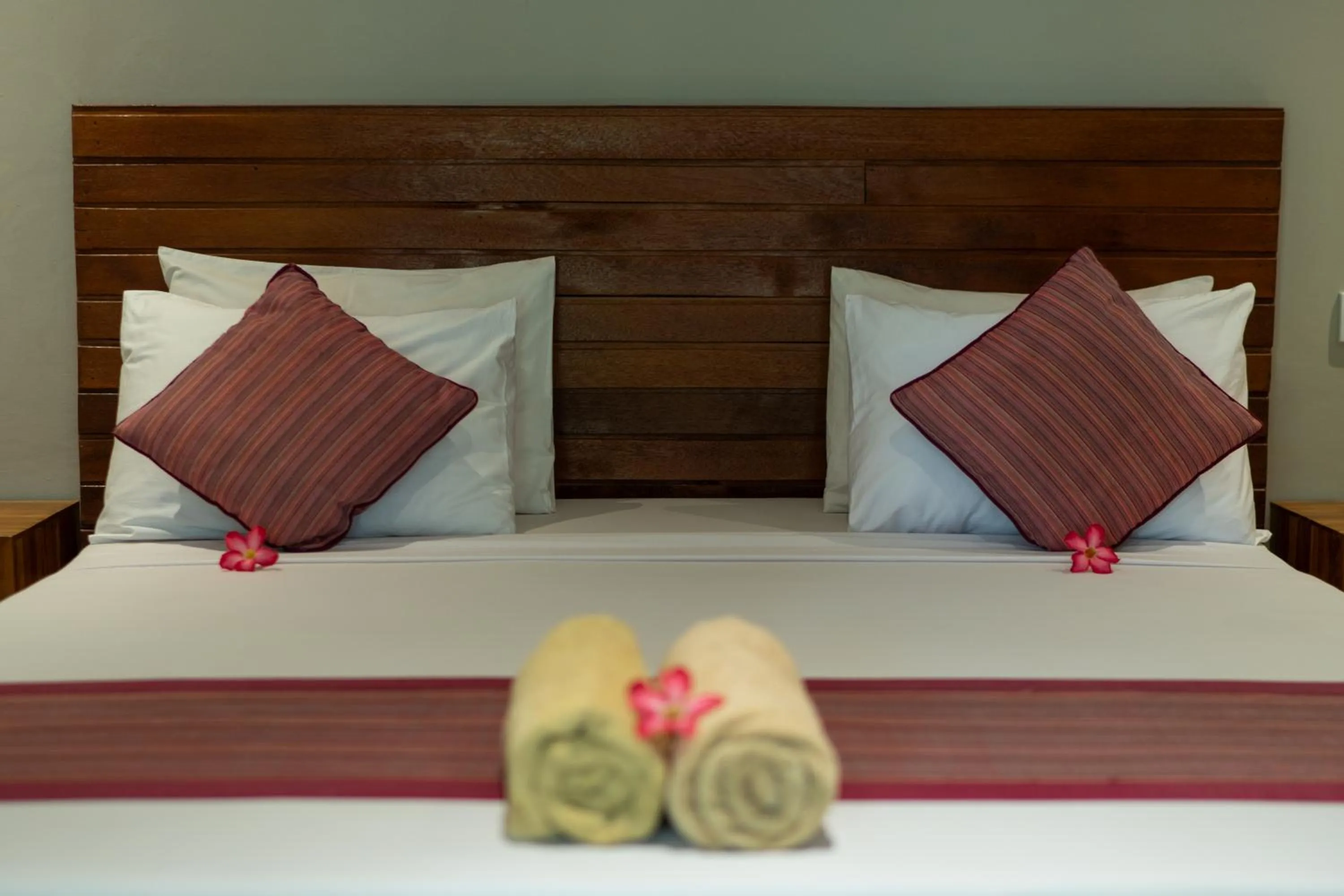 Bed in Warsa's Garden Bungalow and Spa