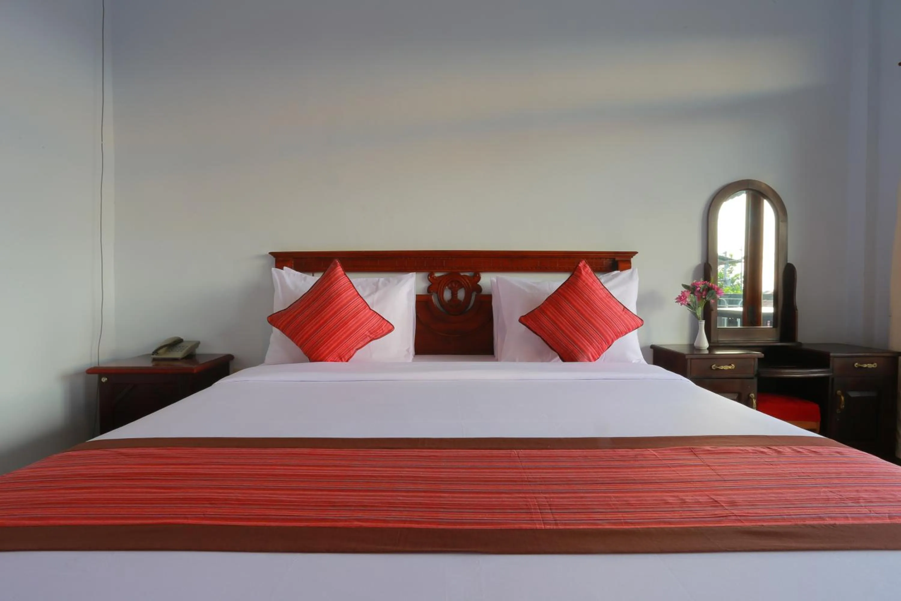 Bed in Warsa's Garden Bungalow and Spa